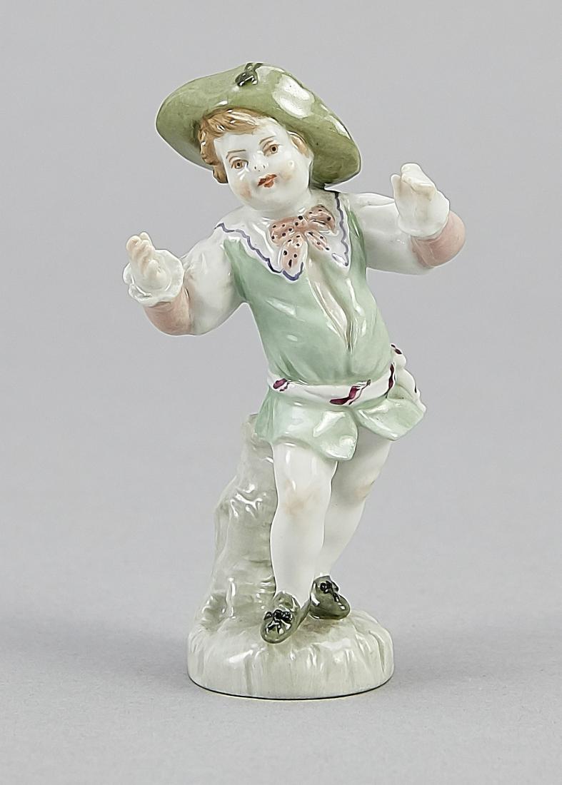 Cupid with hat, KPM Berli: Cupid with hat, KPM Berlin, 1st WW, 1st quality, painter's mark from a series of dressed Cupids, polychrome painted, on round base, wing dam., H. 8.5 cm