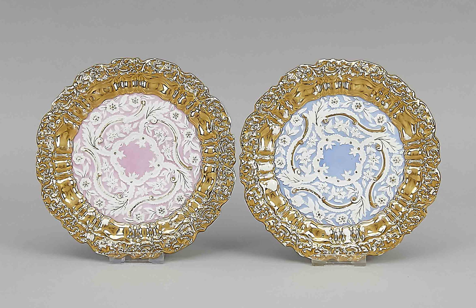 Two plates, Meissen, late: Two plates, Meissen, late 18th century, relief surface, gilded splendor, tws. above, in the mirror pink or light blue background, Ø 21 cm