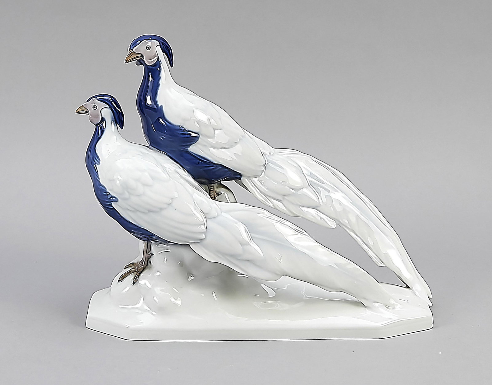 Silver pheasant pair, Rud: Silver pheasant pair, Rudolstadt, Thuringia, 20th century, 2 silver pheasants on a rock base, polychrome painted in underglaze colors, slightly dam., 24 x 28 x 10 cm