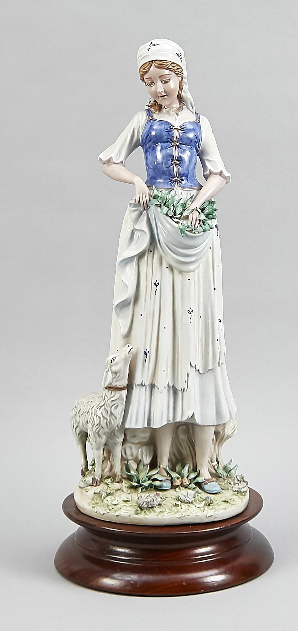 Standing Girl with Lamb,: Standing Girl with Lamb, Porcelanas Artísticas do Cávado (Pac), Portugal, Late 20th C., Girl with headscarf and flowers in apron, min. chipped, standing next to her a lamb, polychrome painted, on a