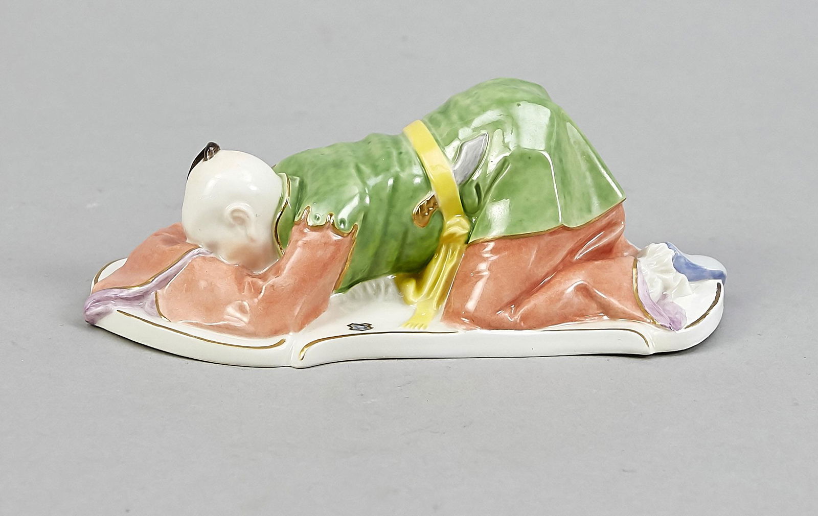 Chinese in the Kotau, Nym: Chinese in the Kotau, Nymphenburg, 20th century, designed by Franz Anton Bustelli, model no. 2212, on a curved base, polychrome painted and gold-plated, L. 16 cm