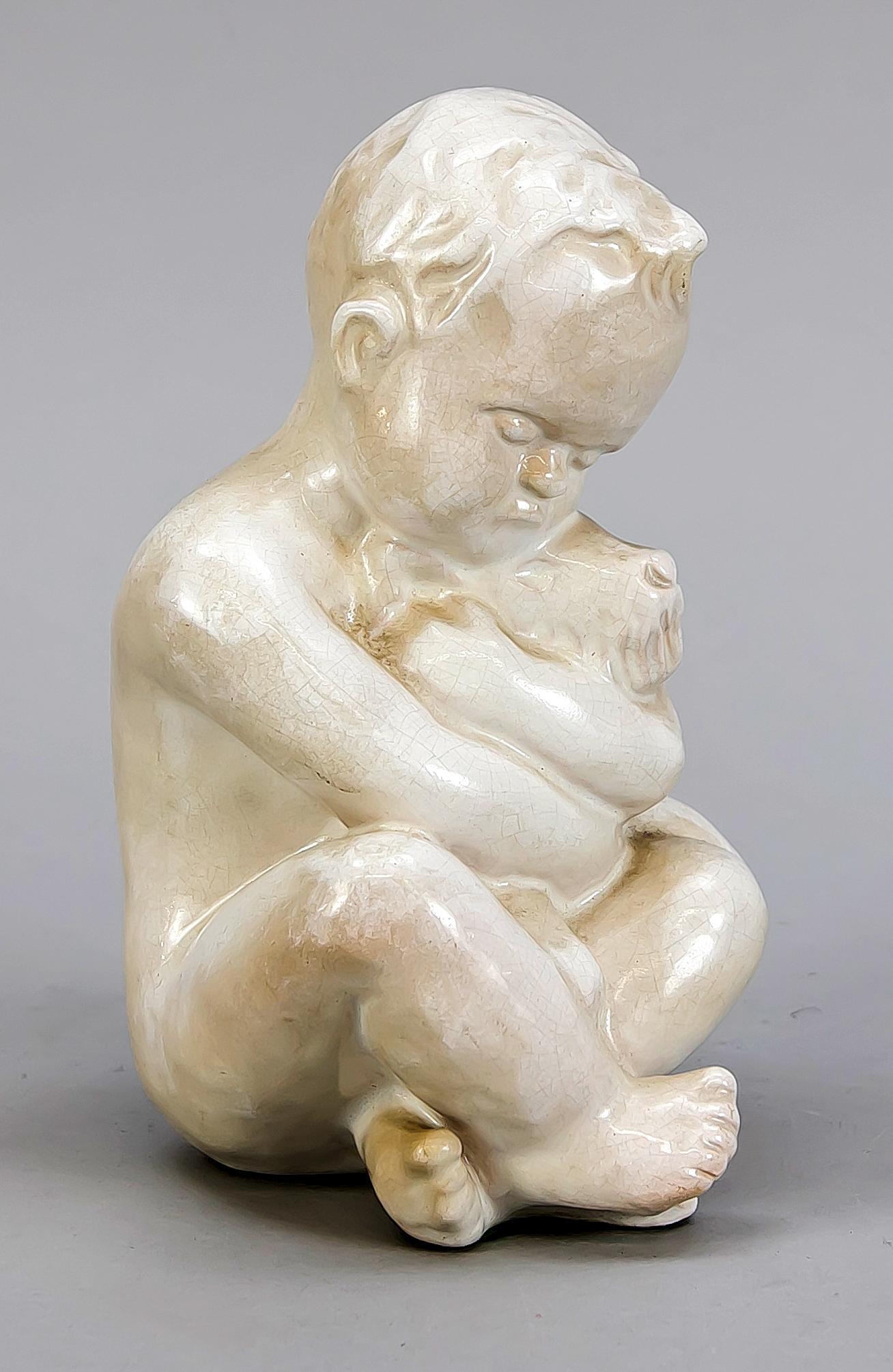 Boy, hugging a dog, ceram: Boy, hugging a dog, ceramic, Michael Andersen, Roenne, Denmark, 19th century, white glazed and crackled, model no. 474. H. 15 cm