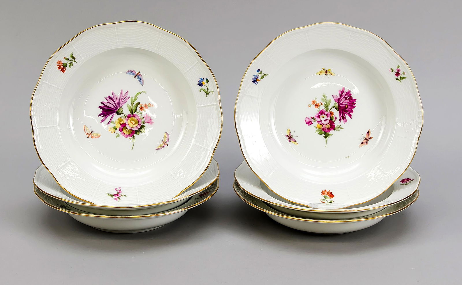 Six soup plates, KPM Berl: Six soup plates, KPM Berlin, beginning 20th century, 1st quality, red painters mark, form Ozier, polychrome flower and insect painting, gold rim, Ø 23.5 cm