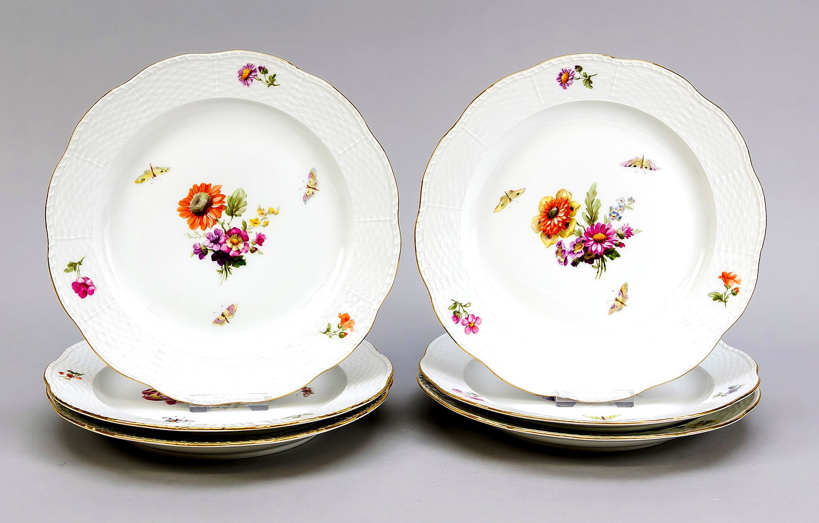 Six dinner plates, KPM Be: Six dinner plates, KPM Berlin, beginning 20th century, 1st quality, red painters mark, form Ozier, polychrome flower and insect painting, gold rim, Ø 24.5 cm