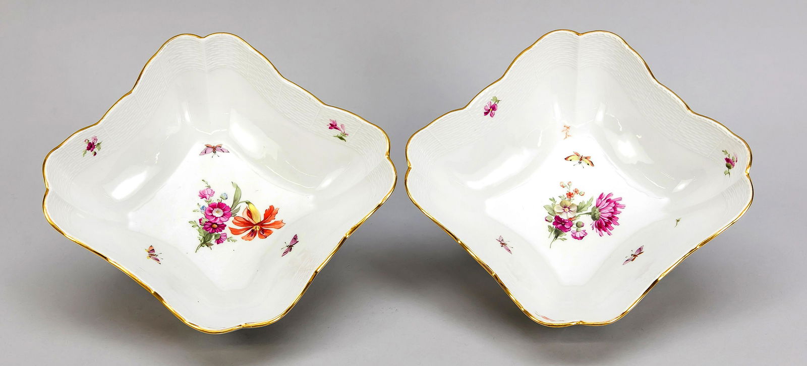 Two CarÃ© bowls / potato b: Two Caré bowls / potato bowls, KPM Berlin, year letter for 1923, 1st quality, red painters mark, polychrome painting with German flowers and insects, gold rim, w. 23 cm