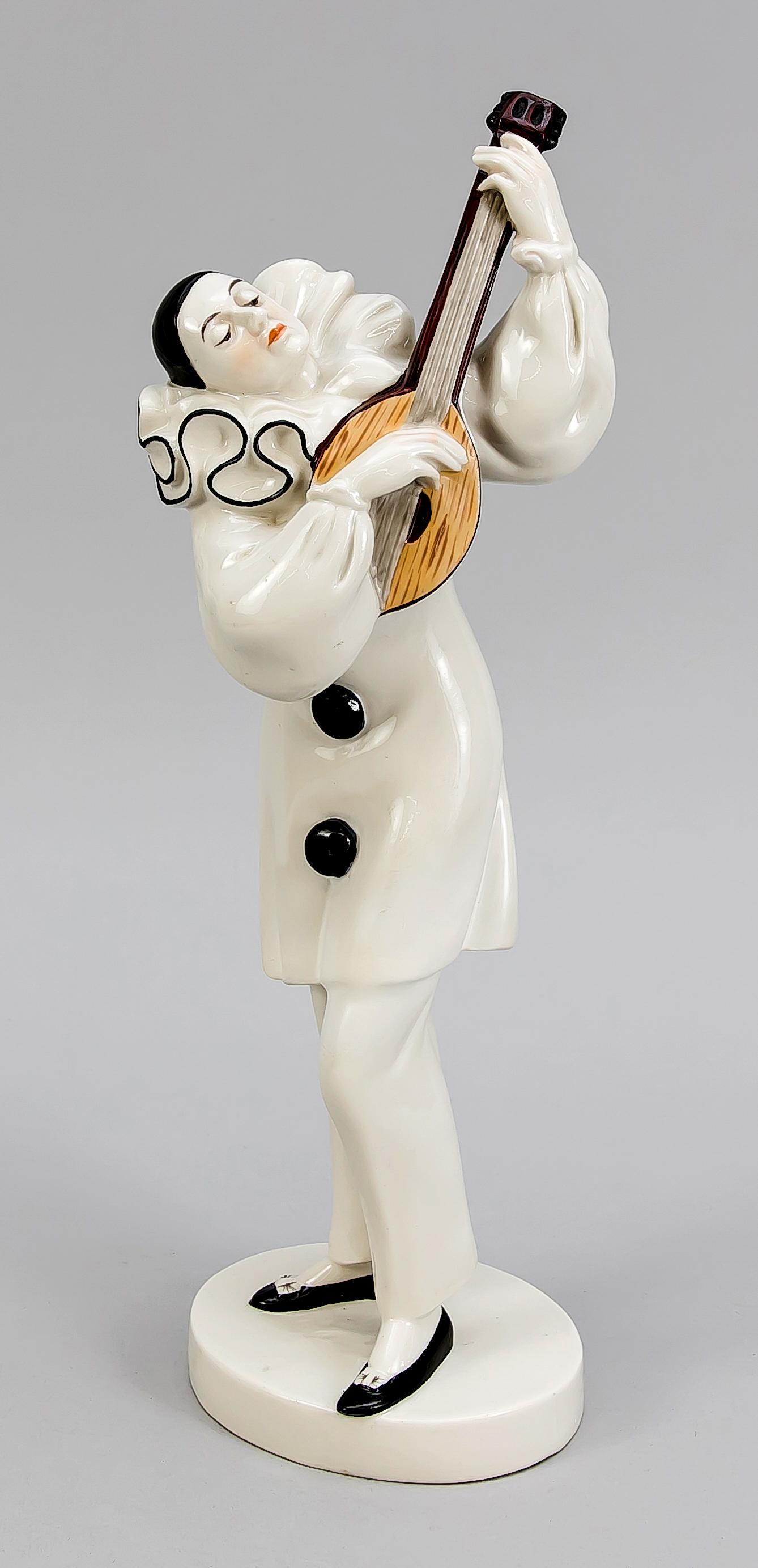 Pierrot with lute, Schwar: Pierrot with lute, Schwarzburger werkstätten, Thüringia, around 1920-30, designed by Dorothea Charol in 1914, model no. U 125, on oval plinth, Pierot playing music, white, slightly colored, 