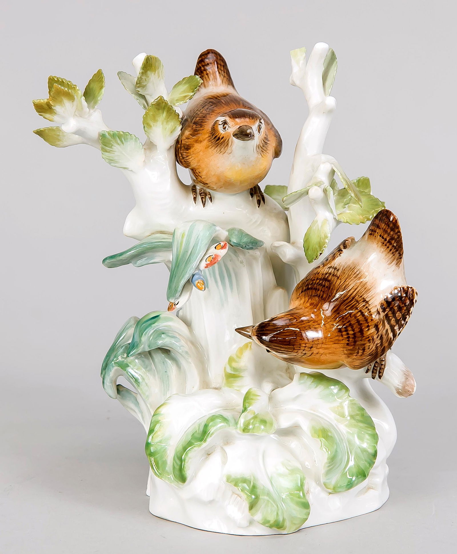 Wren group, Meissen, mark: Wren group, Meissen, mark after 1934, 1st quality, year mark for 1963, designed by August Ringler in 1863; Model no. G 154, 2 birds and butterfly on a tree branch, painted in colors; leaves chipped bu