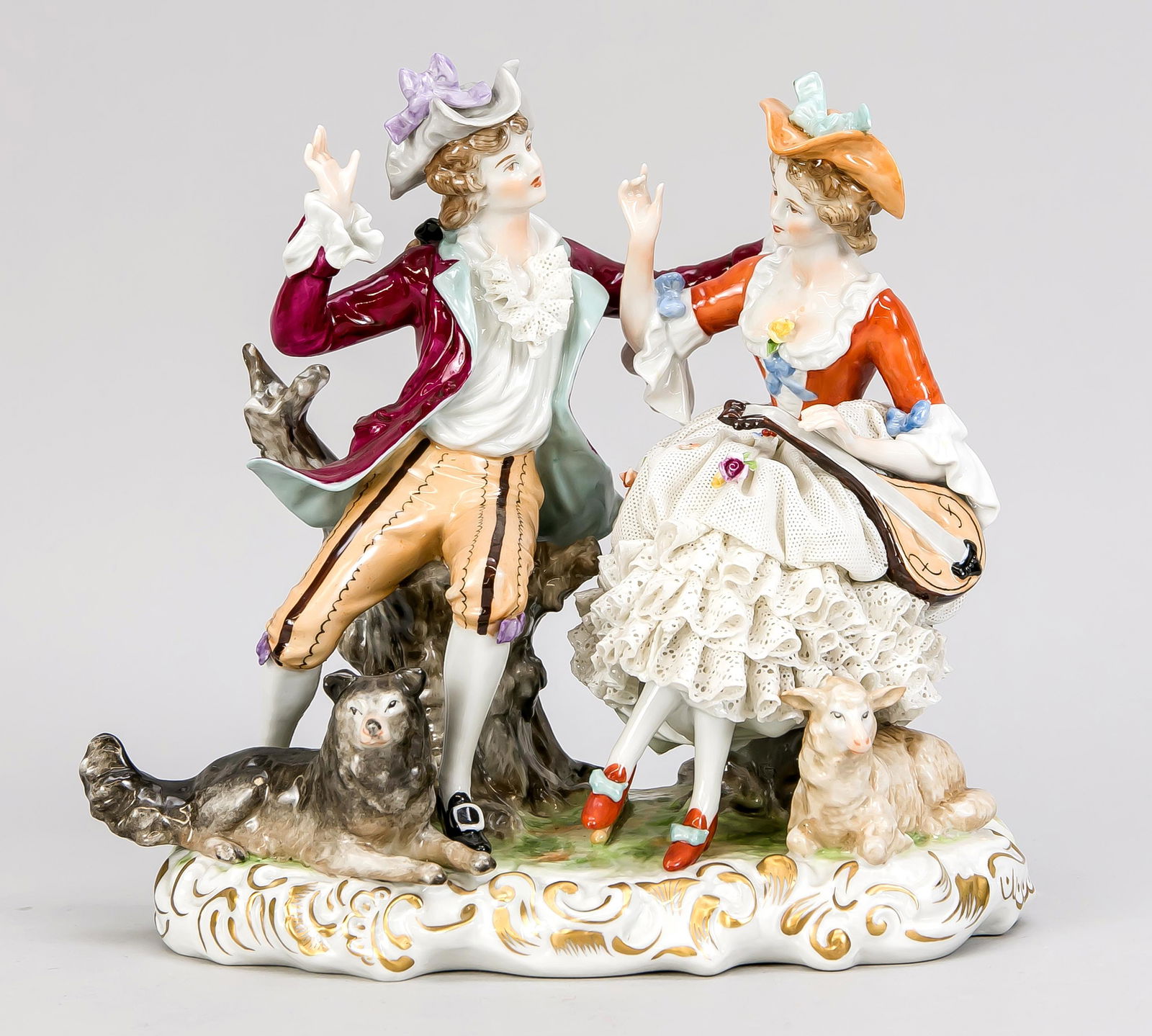 Shepherd group, UnterweiÃŸ: Shepherd group, Unterweißbach, Thuringia, 20th century, elegant couple with lute and flute sitting on tree trunks, at their feet dog and lamb, on oval base, polychrome painted, gilded, tulle chip