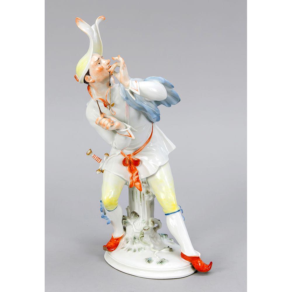 Comedian with triangle, Meisse: Comedian with triangle, Meissen, 1st quality, year mark for 1955, designed by Alexander Struck in 1941, model no. Q 202, player with hat in a moving posture, on an oval base, polychrome painted in lig