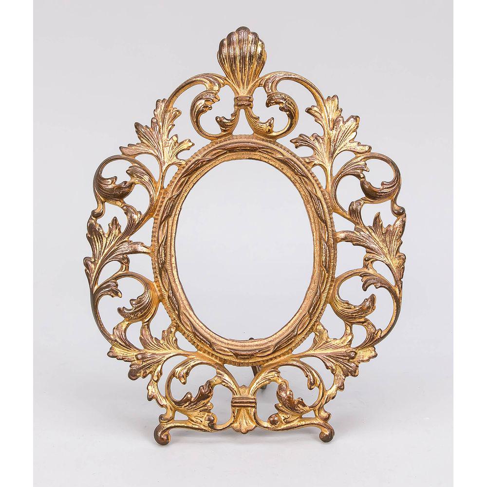 Tischrahmen, Ende 19. Jh., Bro: Tischrahmen, Ende 19. Jh., Bronze mit Restvergoldung. Oval, durchbrochen gearbeitet mit Blattranke. Leicht best. & ber., H. 29 cm