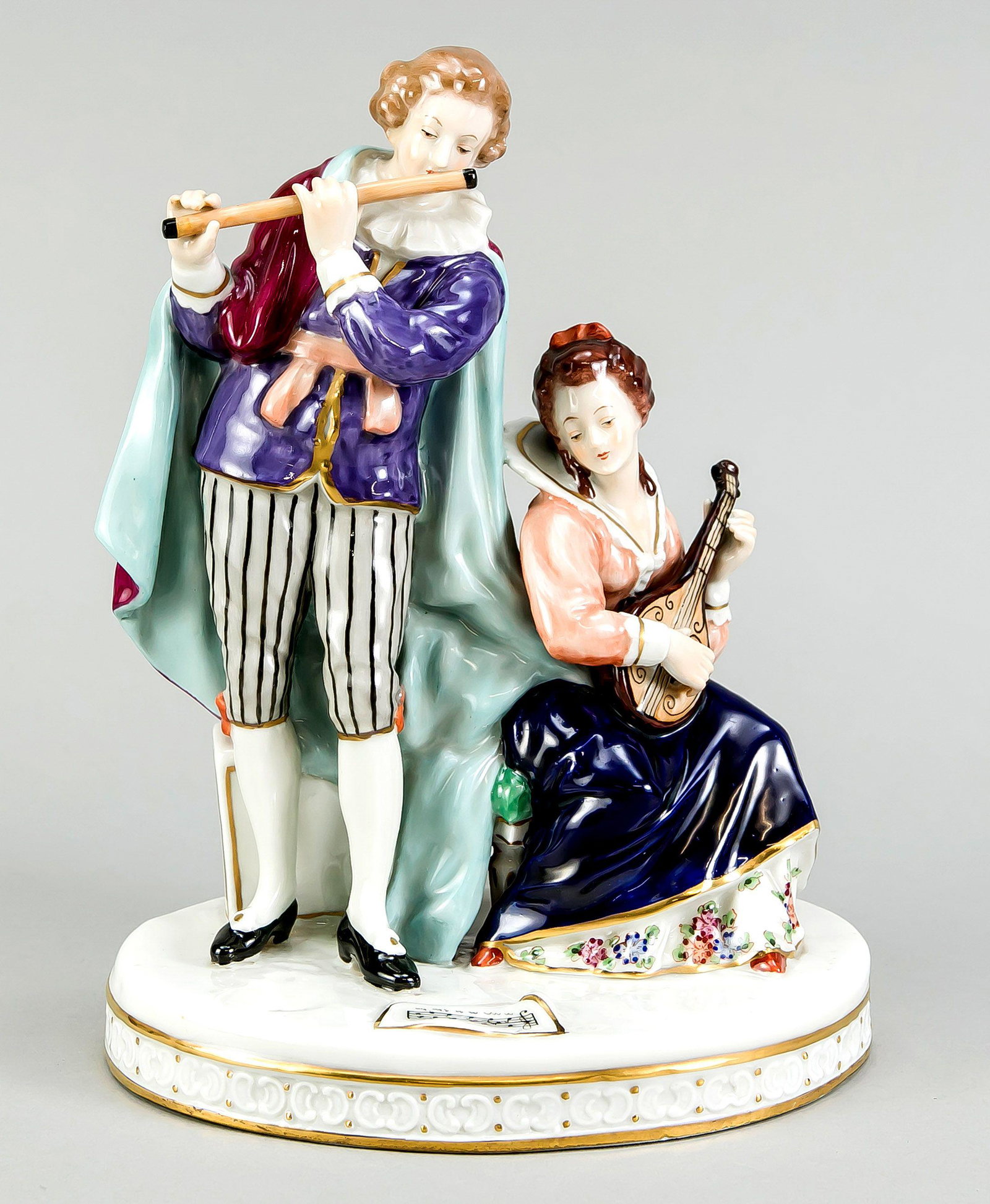 Music group, Rudolstadt, Thuringia,: Music group, Rudolstadt, Thuringia, 20th century, elegant lady playing a lute, accompanied by a cavalier on the flute, at her feet is the sheet of music, on oval base, polychrome painted, ornamental g
