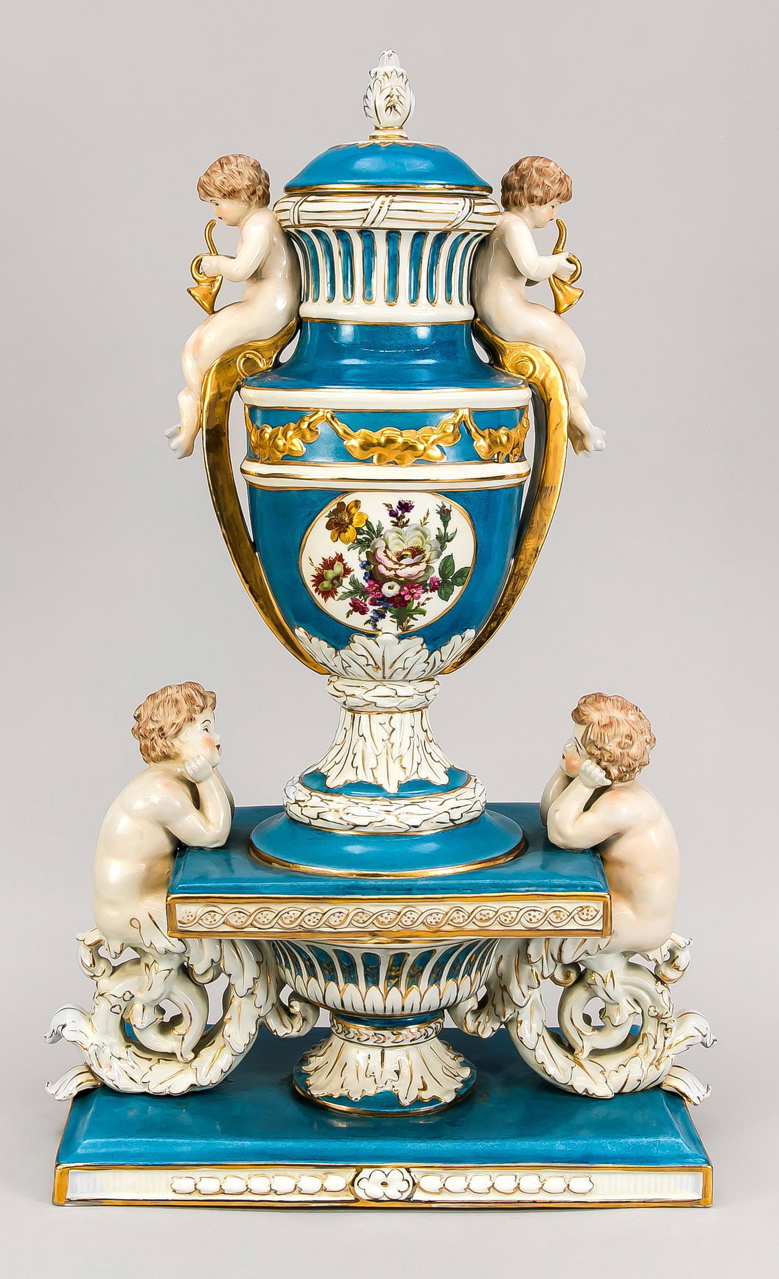 Splendid centerpiece, late 20th c.,: Splendid centerpiece, late 20th c., mark with dragon in the coat of arms, lidded vase with side handles on a multi-tiered pedestal, on the sides 2 pairs of putti, 1 pair musing, 1 pair with musical in