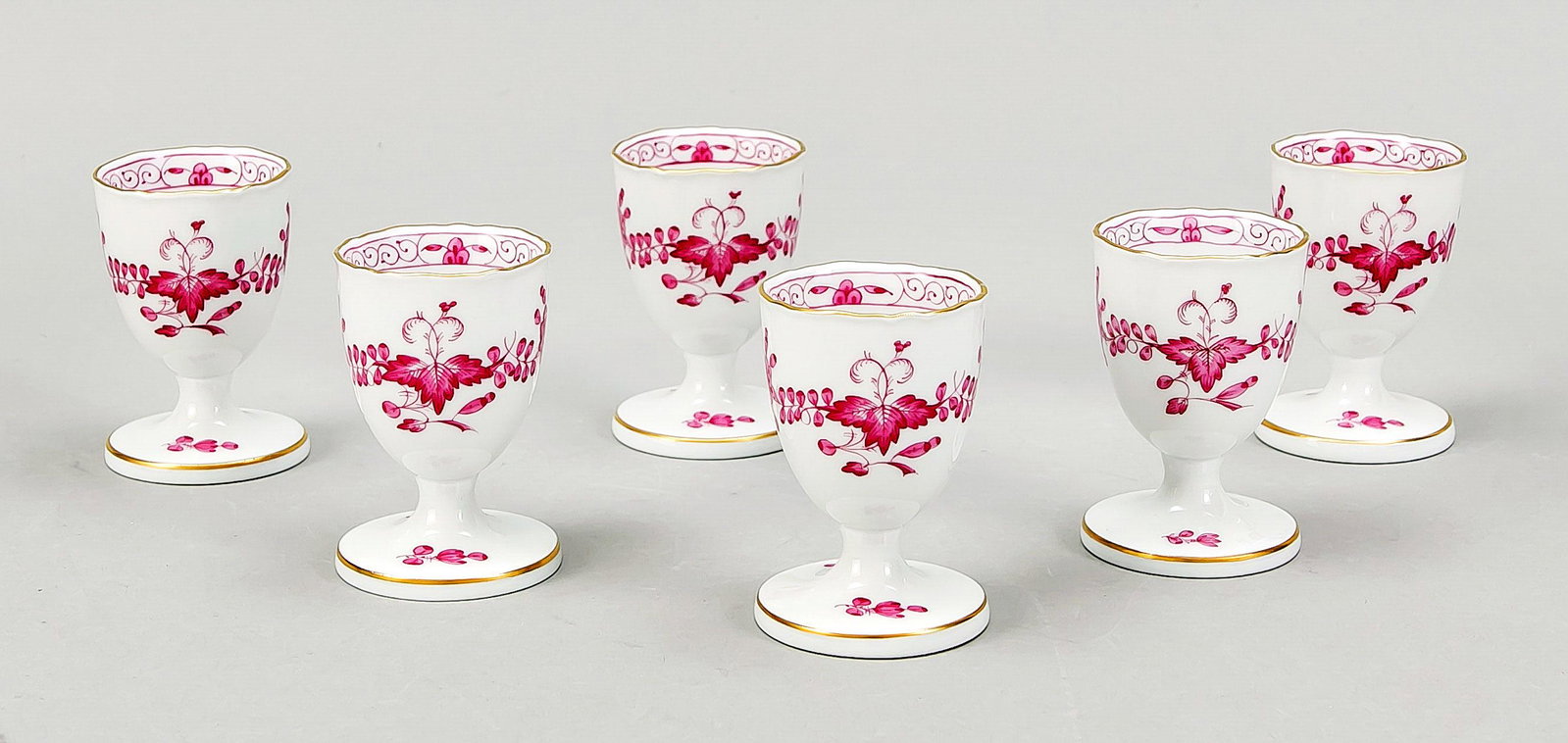 Six egg cups, Meissen, end of: Six egg cups, Meissen, end of 20th century, 1st choice, decor Indian purple with gold rim, h. 7 cm