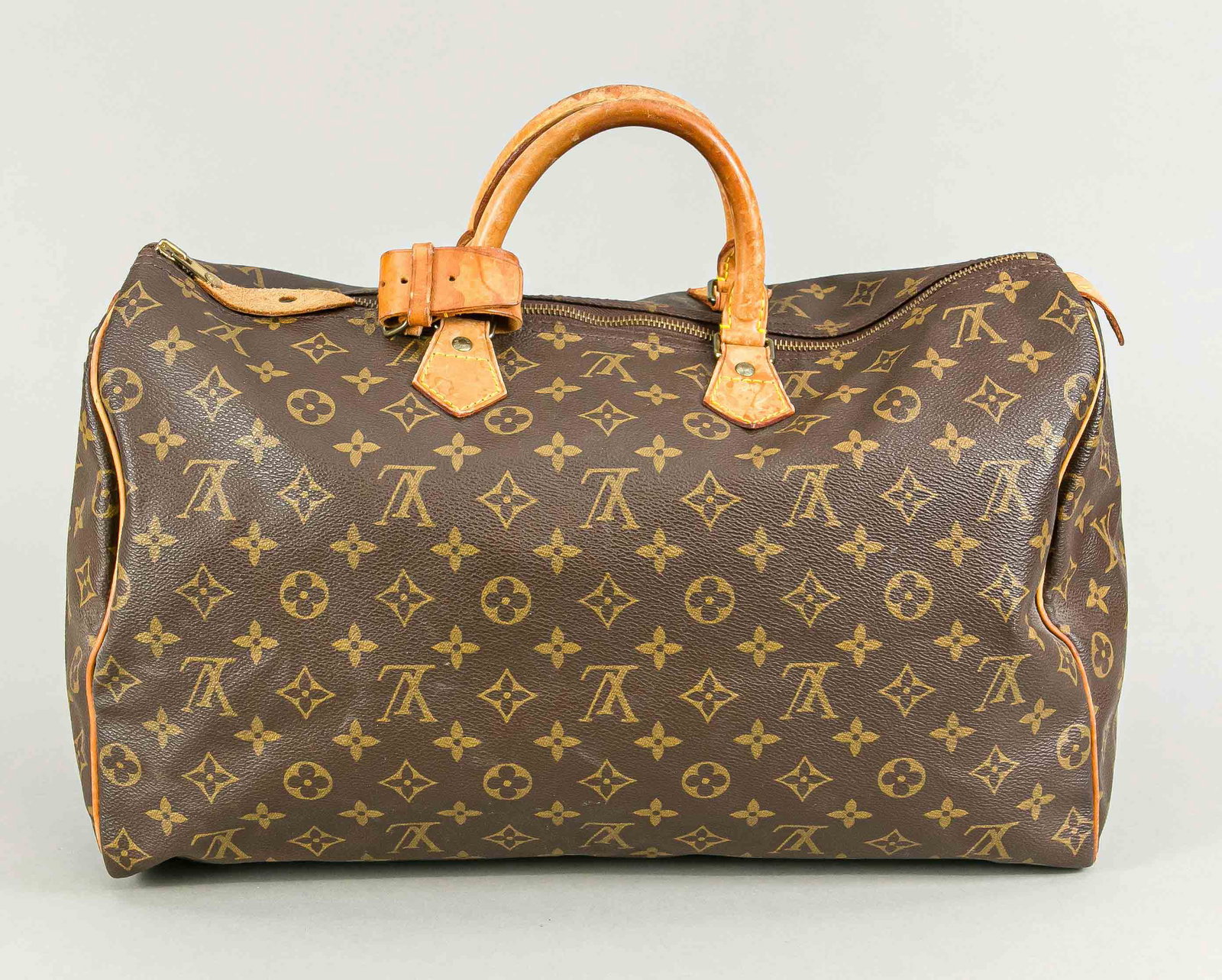 Louis Vuitton, Vintage Monogra: Louis Vuitton, Vintage Monogram Canvas Speedy 40, rubberized cotton fabric in classic logo print design with cognac cowhide leather details, short double handles, textile interior, lock (key missing),