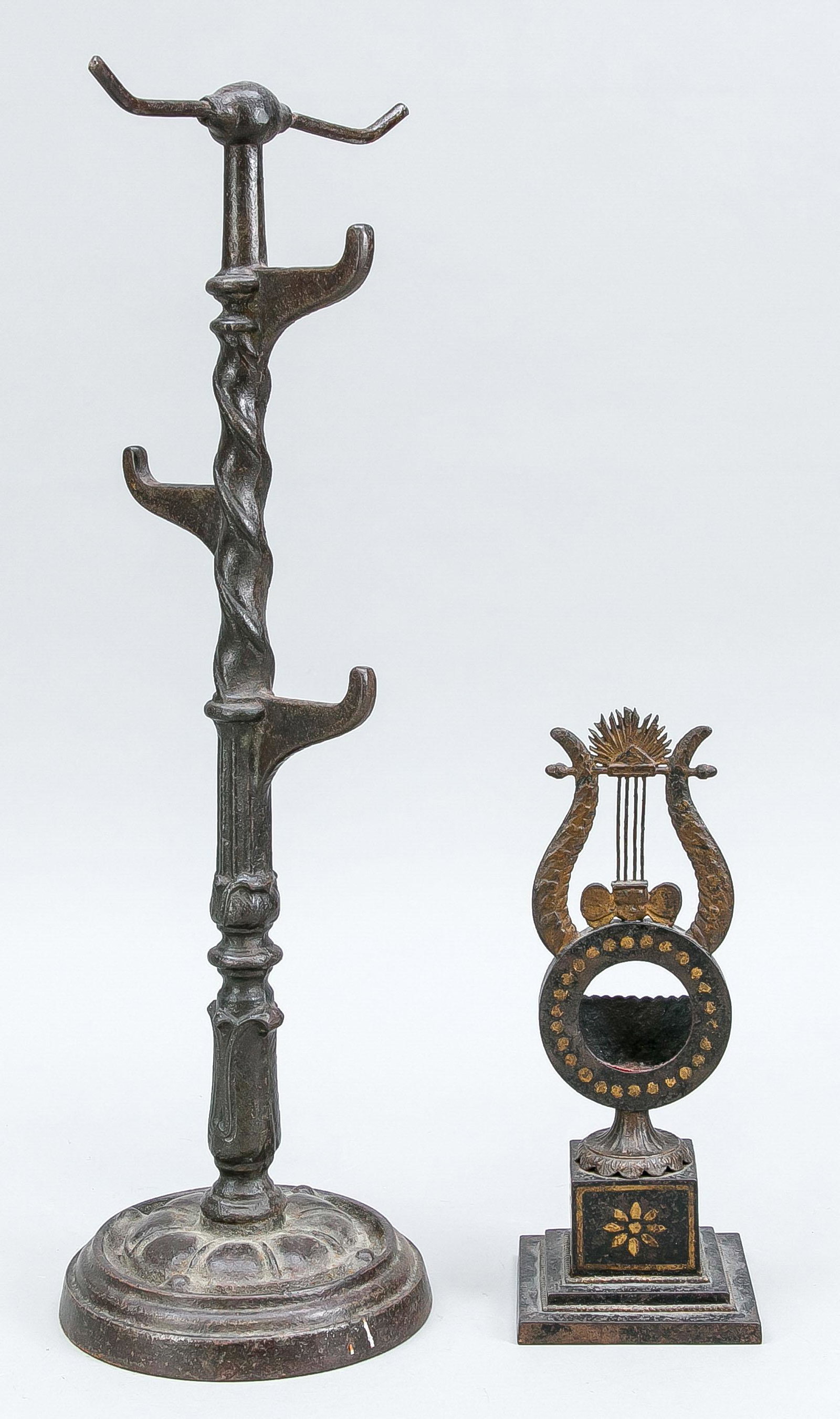 2 parts old iron, end of 19th: 2 parts old iron, end of 19th c., 1 x lyre-shaped pocket watch stand (h. 24 cm), 1 x chain holder (h. 46 cm)