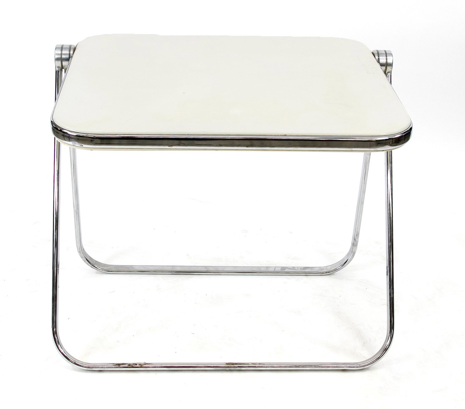 Folding table, Italy 20th c.,: Folding table, Italy 20th c., CASTELLI, plastic and metal, 70 x 74 x 63 cm.