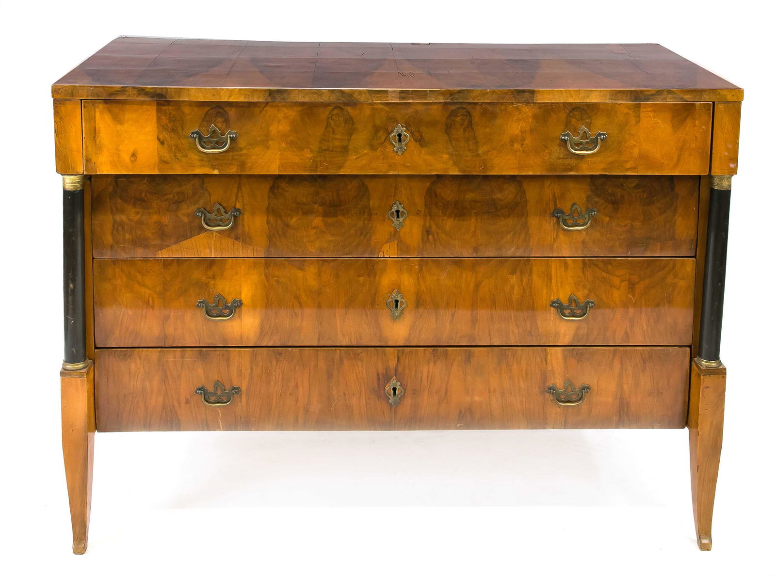 Biedermeier commode circa 1810: Biedermeier commode circa 1810, walnut veneer, straight corpus on slightly curved legs, four drawers flanked by ebonized solid columns, fittings secondary, 97 x 124 x 56 cm