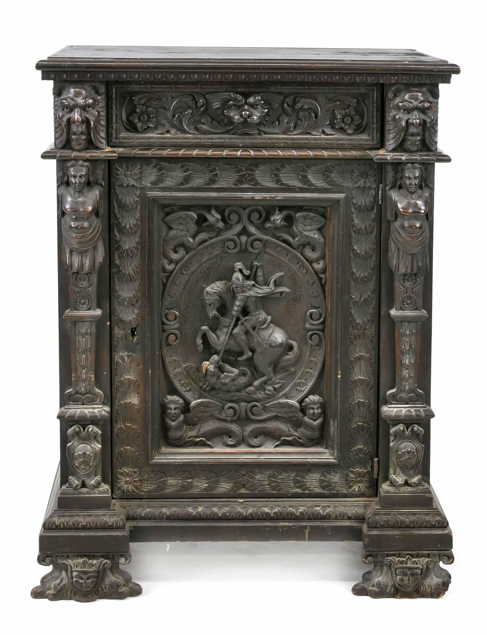 Historism half-cabinet around: Historism half-cabinet around 1880, walnut ebonized/black stained, carved decoration typical for the period on the front, sculptural depiction of George the dragon slayer, flanked by entablature figur
