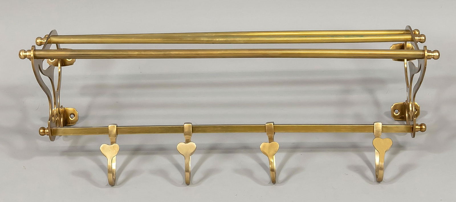 Coat rack, 20th century, brass. M: Coat rack, 20th century, brass. Movable hooks with hearts, w. 66 cm