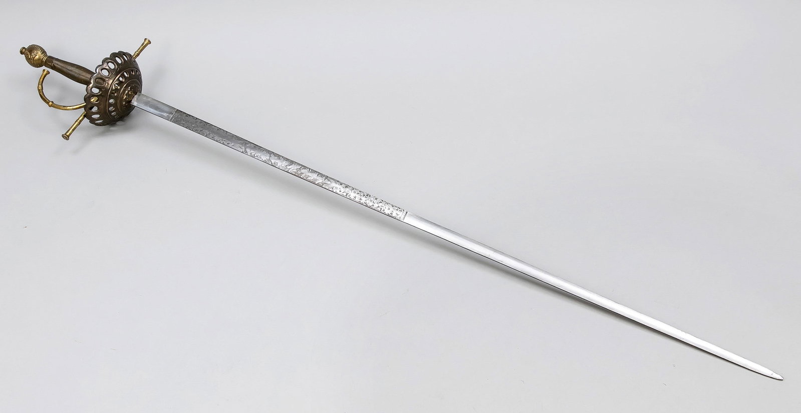 Rapier, 19th century, blade decor: Rapier, 19th century, blade decorated on both sides, basket with side bolsters, hilt rubbed, without scabbard, l. 107 cm
