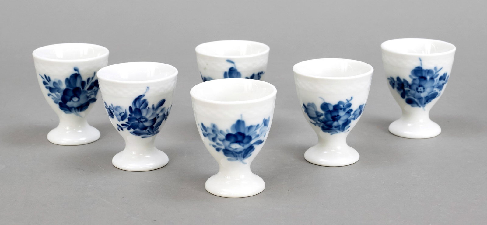 Six egg cups, Royal Copenhagen: Six egg cups, Royal Copenhagen, Copenhagen 1960s, Ozier shape, Blue Flower decor, h. 6 cm