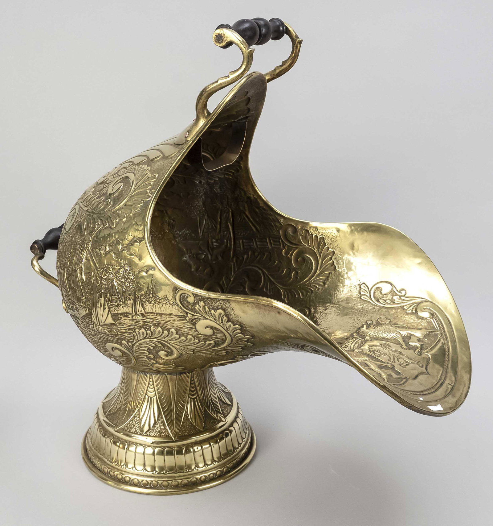 Coal chute, end of the 19th centur: Coal chute, end of the 19th century, brass sheet with relief decoration on all sides, turned wooden handle, h. 51 cm
