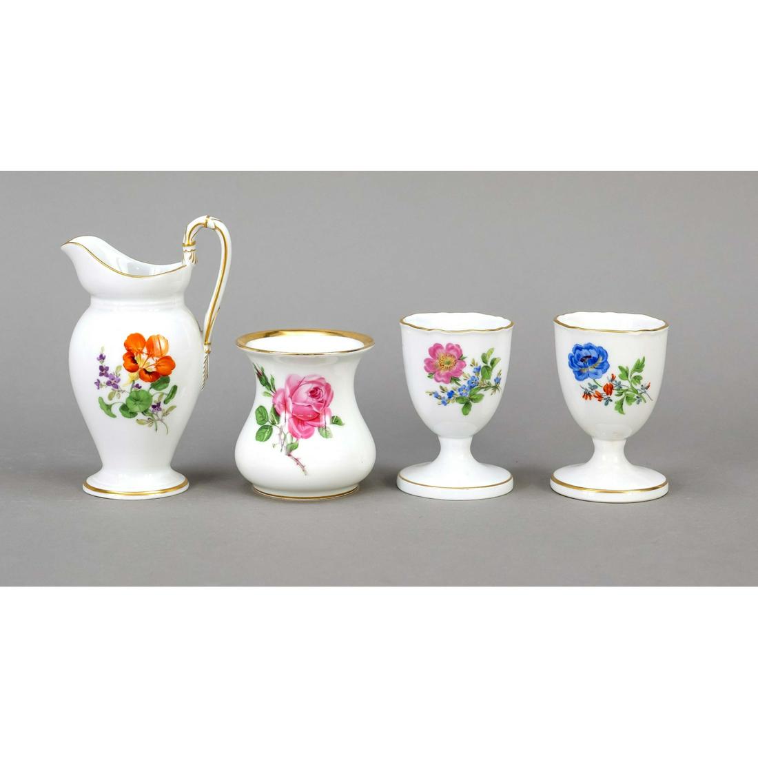 Four pieces Meissen, marks anch 193: Four pieces Meissen, marks anch 1934, polychrome floral painting, gold rims, cream jug with high handle, 1970s, 2nd choice, h. 12 cm, small vase with red rose, h. 6 cm, 2 egg cups, h. 7 cm