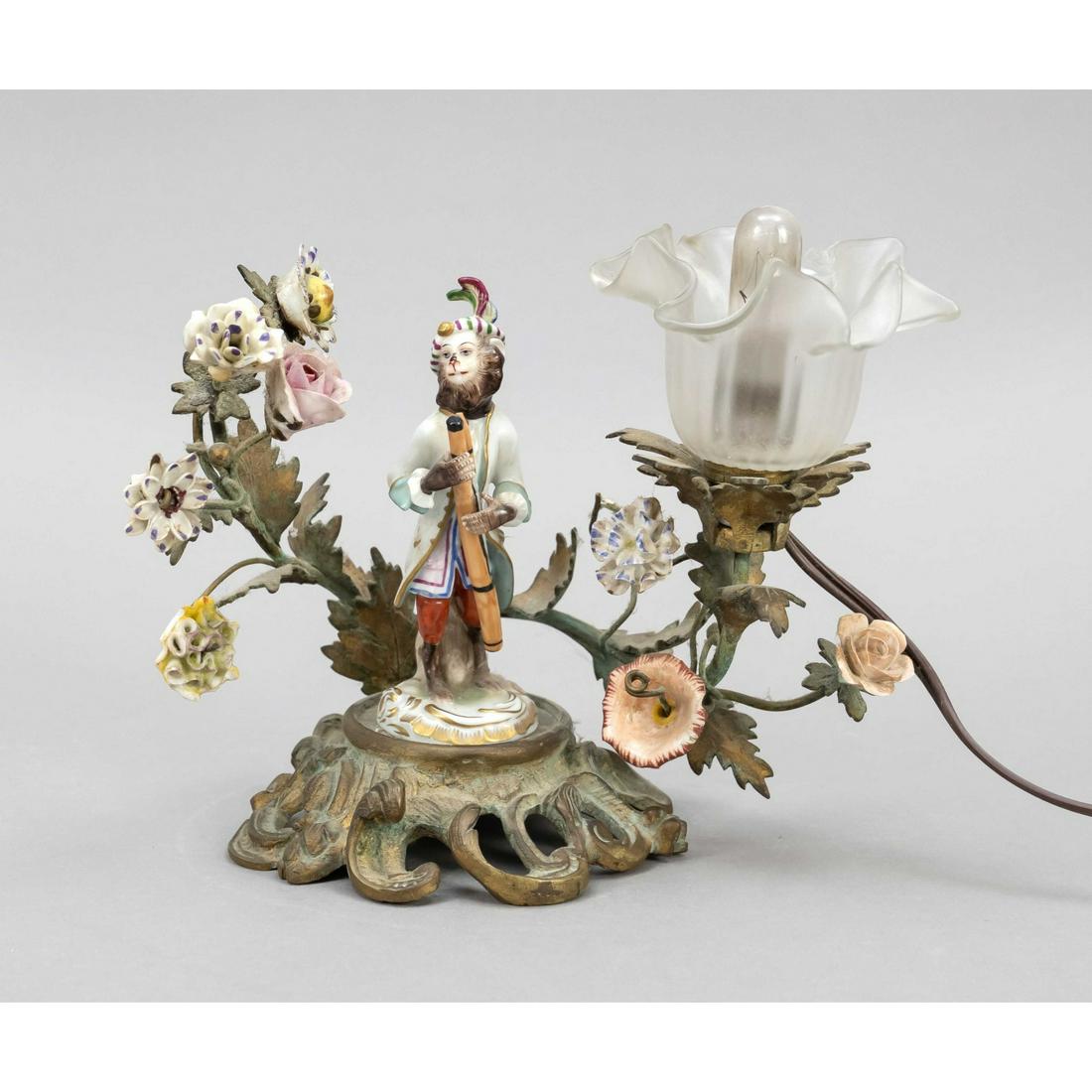 Night lamp, end of the 19th century: Night lamp, end of the 19th century, a monkey with a porcelain bassoon standing on a floral openwork bronze base with blossom branches, from the series of the Monkey Chapel after Meissen model, blosso