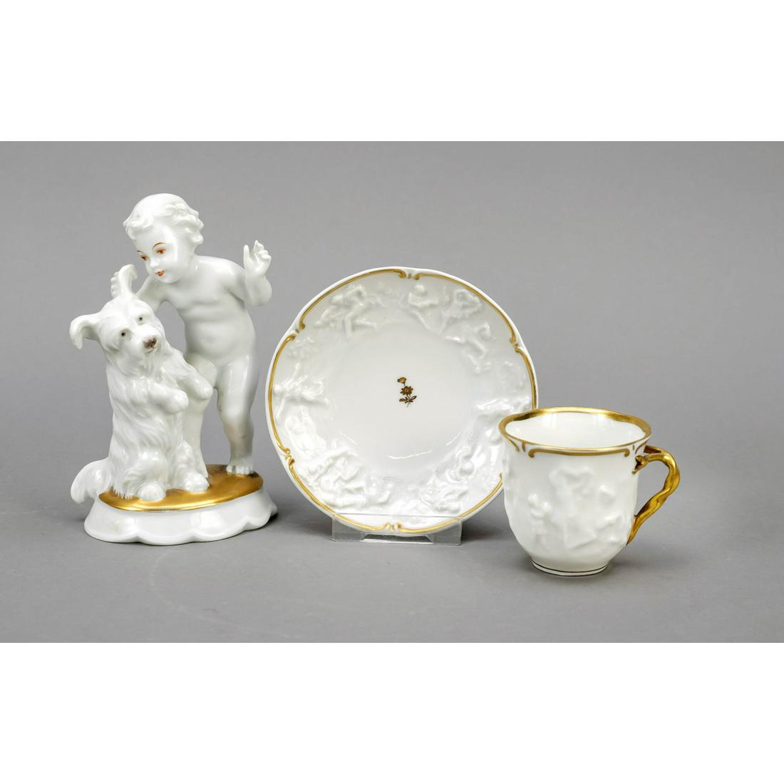 Putto and cup, shepherd's hour, Ros: Putto and cup, shepherd's hour, Rosenthal, Selb, 1930, design M. H. Fritz 1917, model no. 475, boy whispering into the ear of the shepherd dog, on oval base, ornamental gilding, h. 15 cm, plus cup and