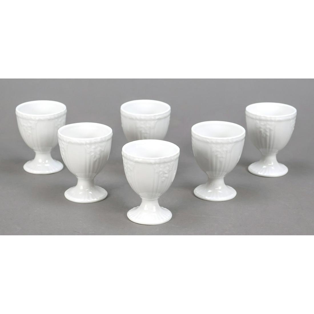 Six egg cups, KPM Berlin, marks 196: Six egg cups, KPM Berlin, marks 1962-1992, 2nd choice, form Rocaille, design by Friedrich Elias Meyer, white, h. 6,5 cm