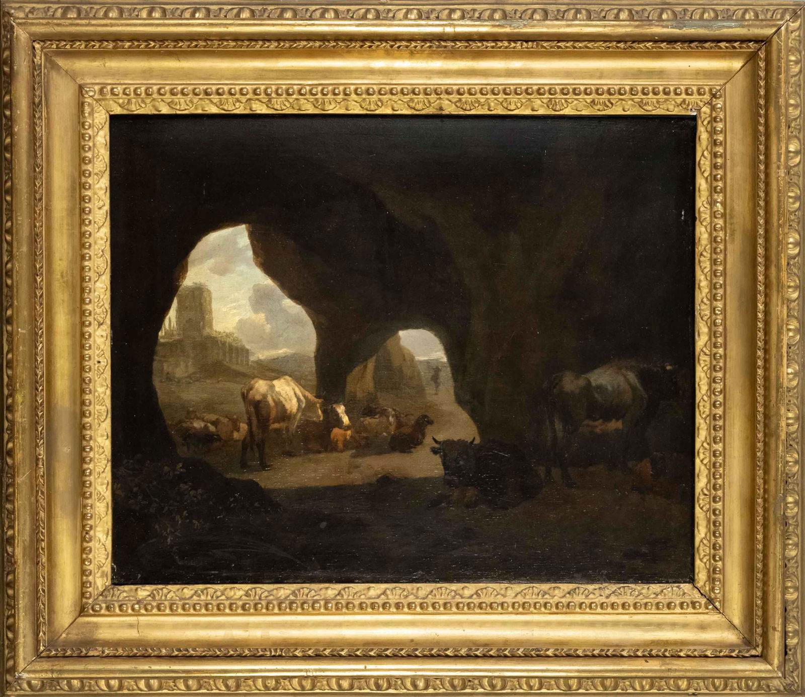 Johann Heinrich Roos (1631-1685),: Johann Heinrich Roos (1631-1685), Circumcircle/Succession, Cattle resting in and in front of a cave with a view of an Italian landscape with ruins, oil on panel, unsigned, restored a. retouched, 37 x