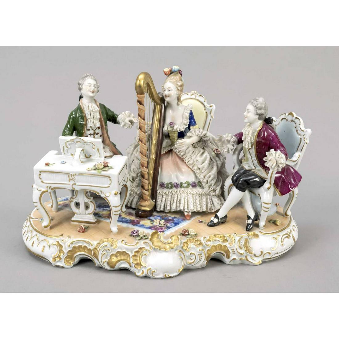 Large gallant figure group, Unter: Large gallant figure group, Unterweissbach, Thuringia, mark 1962-90, rococo society playing music, rocaille base, polychrome painted, ornamental gilding, tulle and flower trim partly bumped, l. 37 cm
