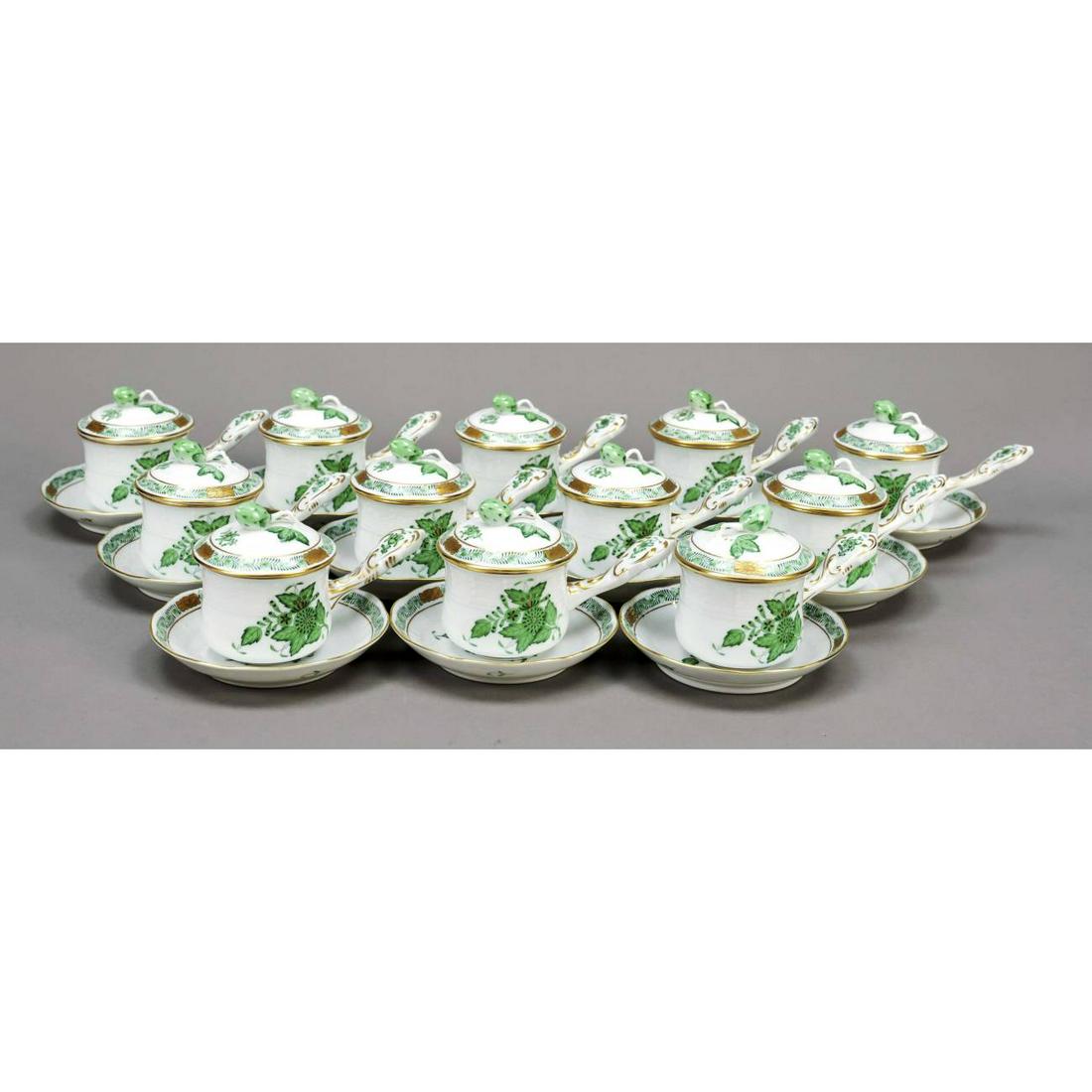 Twelve turtle soup cups, each wit: Twelve turtle soup cups, each with a lid and a saucer, Herend, 20th century, Ozier form, Aponyi decor in green, ornamental gilding, model no. 749, h. 8 cm