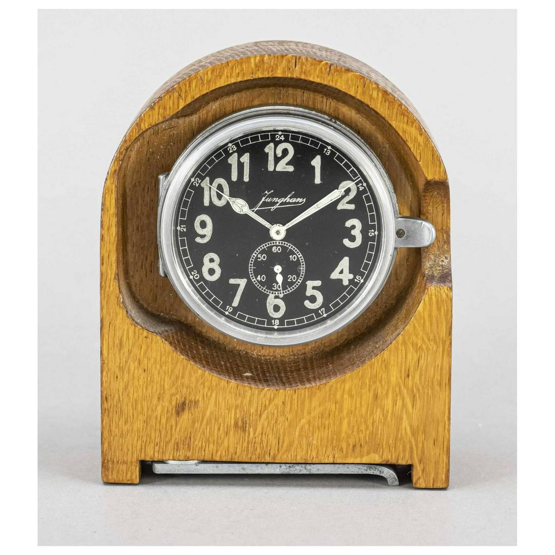 Borduhr Junghans rebuilt as table c: Borduhr Junghans rebuilt as table clock, in the bottom marked Heereseigentum 1939 Junghans No. 5782, black dial with luminous numerals, luminous hands, small second at 6 o'clock, faceted glass in the