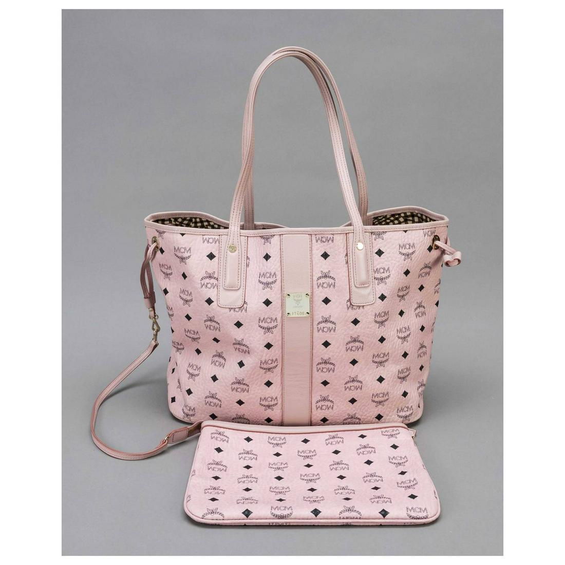 MCM, Pink Liz reversible shopper, p: MCM, Pink Liz reversible shopper, pink coated faux leather with heritage pattern logo print in black and pink smooth leather details, gold-tone hardware, narrow double handles, side drawstrings, texti