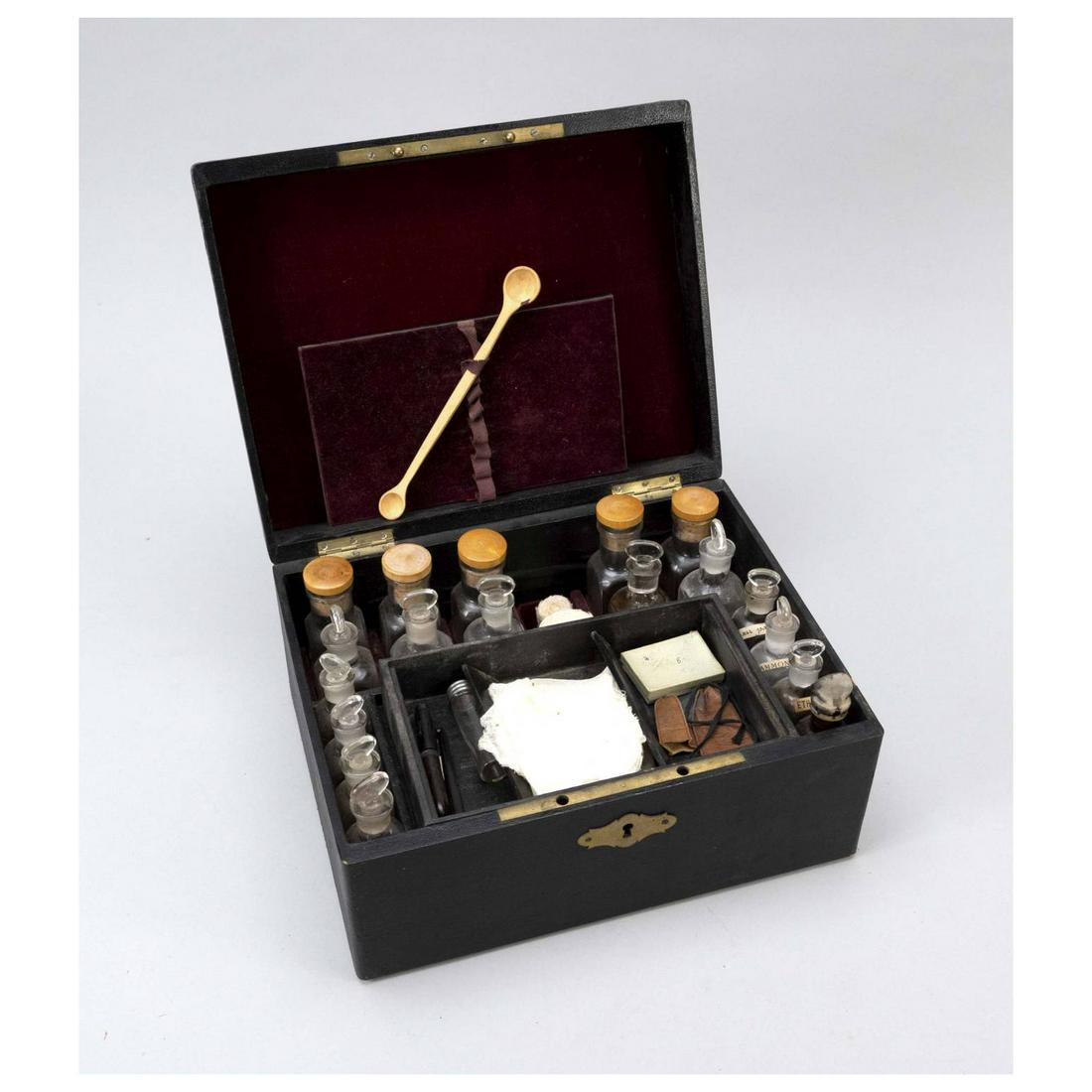 Apothecary box, late 19th c. Recta: Apothecary box, late 19th c. Rectangular box with hinged lid (lock with key), brass strike plate and handle. Interior with various glass vials and other utensils, slightly rubbed, not checked for comp