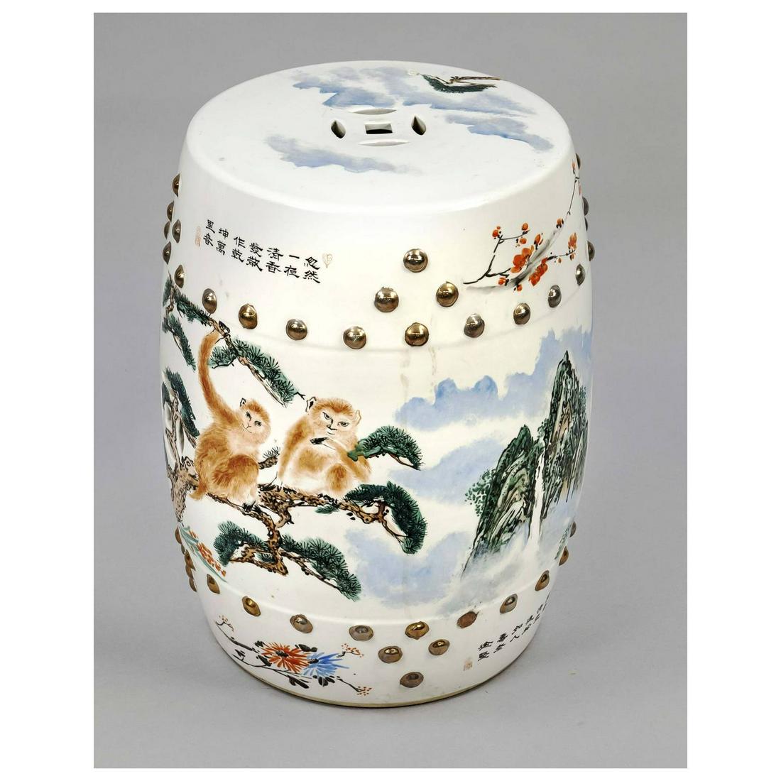 Monkey stool, China, 20th c., porce: Monkey stool, China, 20th c., porcelain drum with openwork and fine polychrome glaze painting of monkeys in pine mountains and under flowering plum blossom branches and bamboo bushes, 45x33cm
