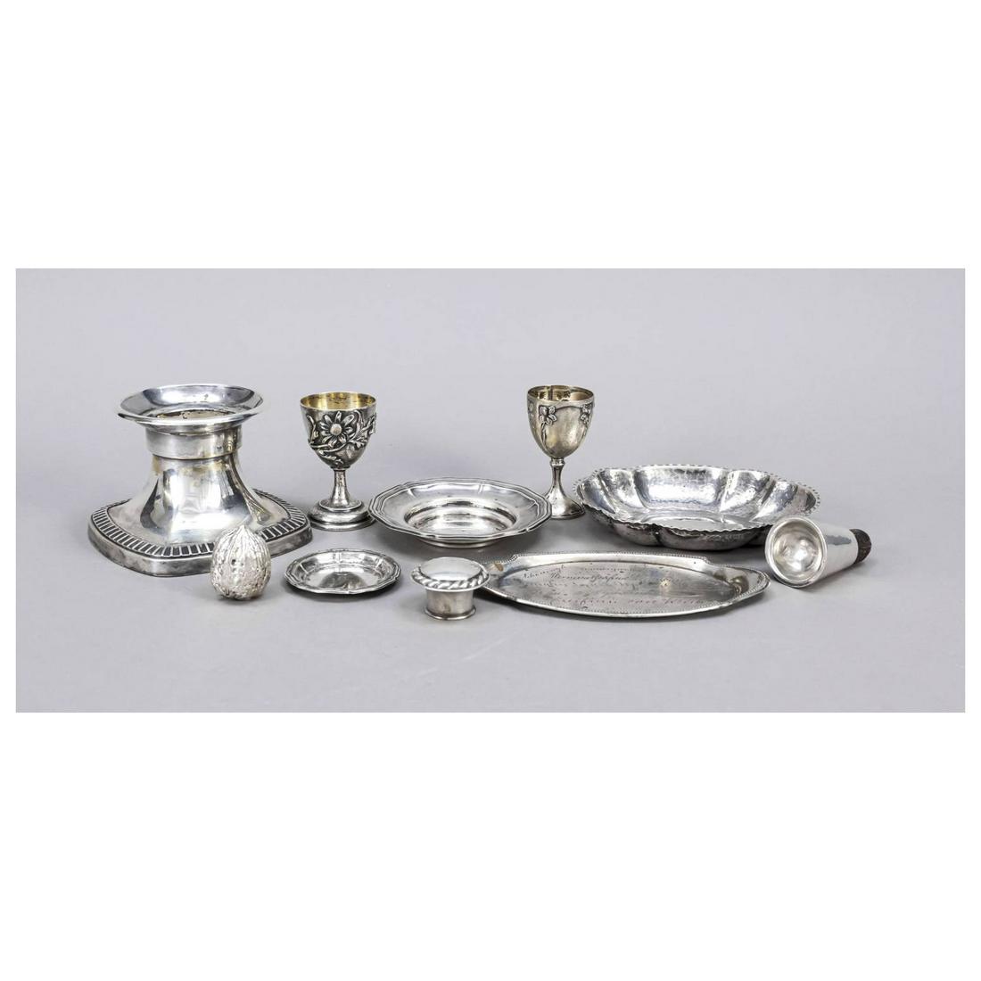 Mixed lot of ten small pieces, 20th c: Mixed lot of ten small pieces, 20th c., different makers, silver different finenesses, resp. tested, 4 bowls, 2 cork holders, 2 egg cups, walnut and candlestick, 1x with name engravings, 1x with monog