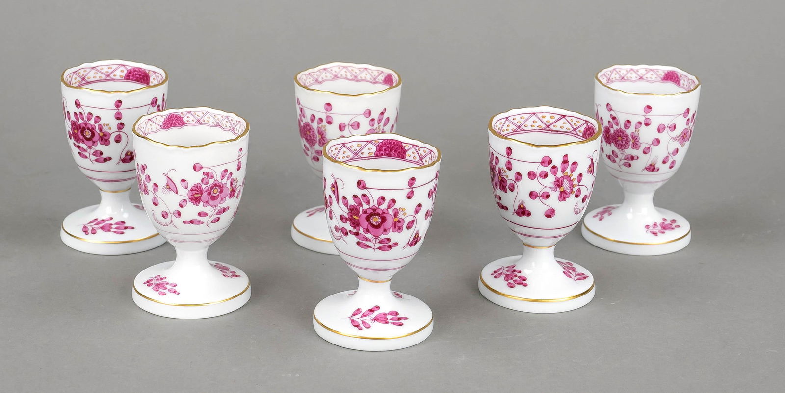Six egg cups, Meissen, marks aft: Six egg cups, Meissen, marks after 1980, 1st choice shape New cutout, decor Indian purple, ornamental gilding, h. 7,5 cm