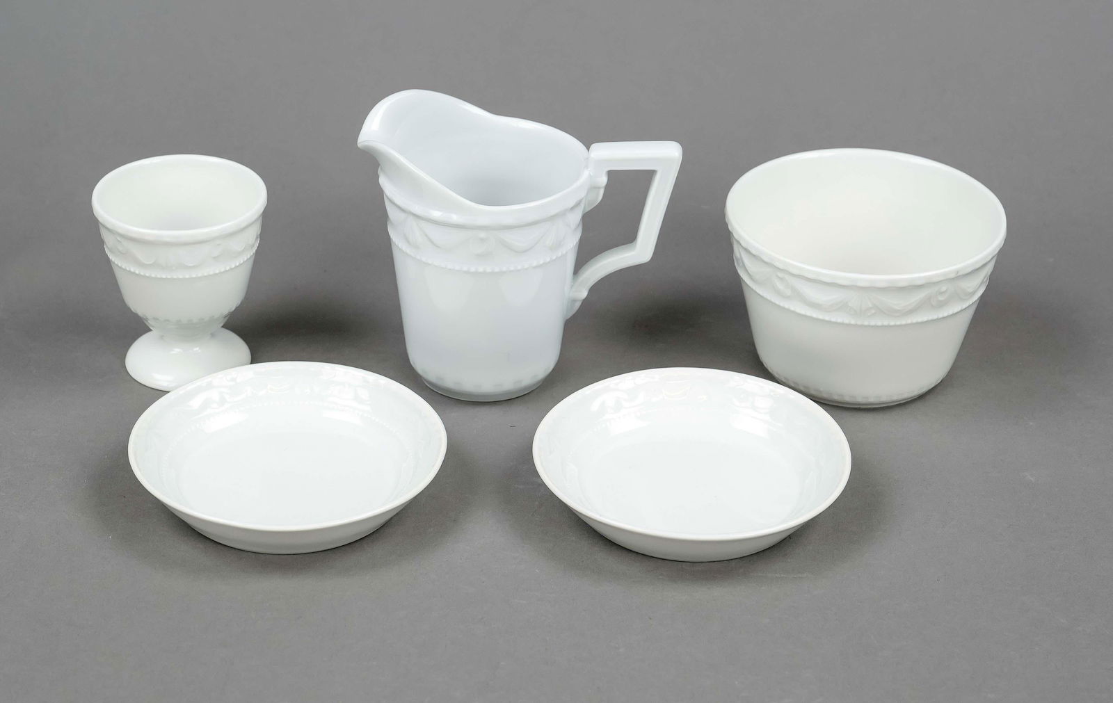 Set of 5 pieces, KPM Berlin, 2nd: Set of 5 pieces, KPM Berlin, 2nd half of 20th century, form Kurland, design for the last duke of Kurland around 1790 by Friedrich Elias Meyer, white, egg cup, h. 6 cm, milk jug, h. 8,5 cm, pair of sma