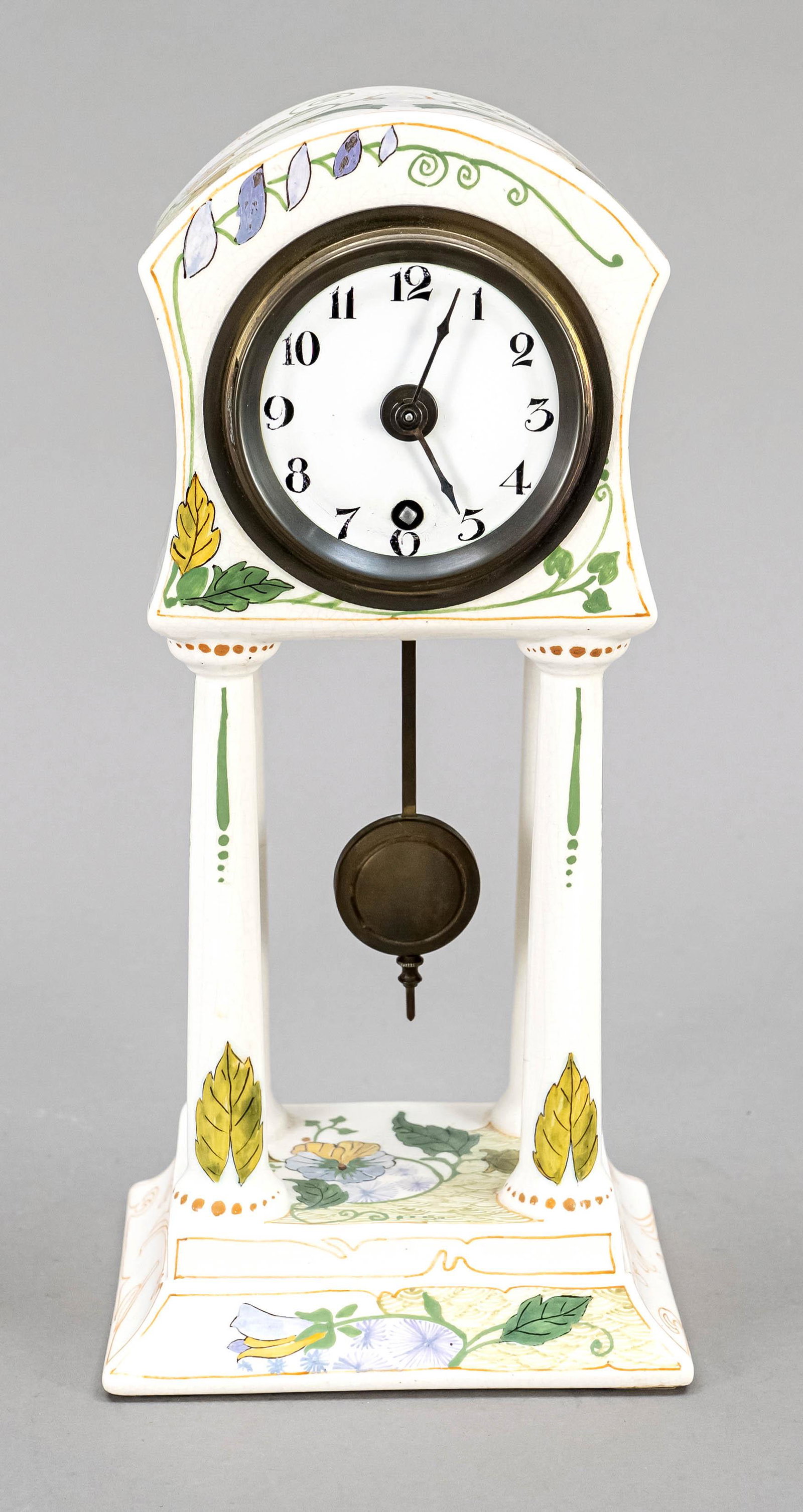 Art nouveau pendulum, porcelain, polychrome floral painted, in the foot marked ''Zwid Holland,: Art nouveau pendulum, porcelain, polychrome floral painted, in the foot marked ''Zwid Holland, Gouda'', clock case supported on 4 columns, porcelain with light craquelure, white metal dial with black 