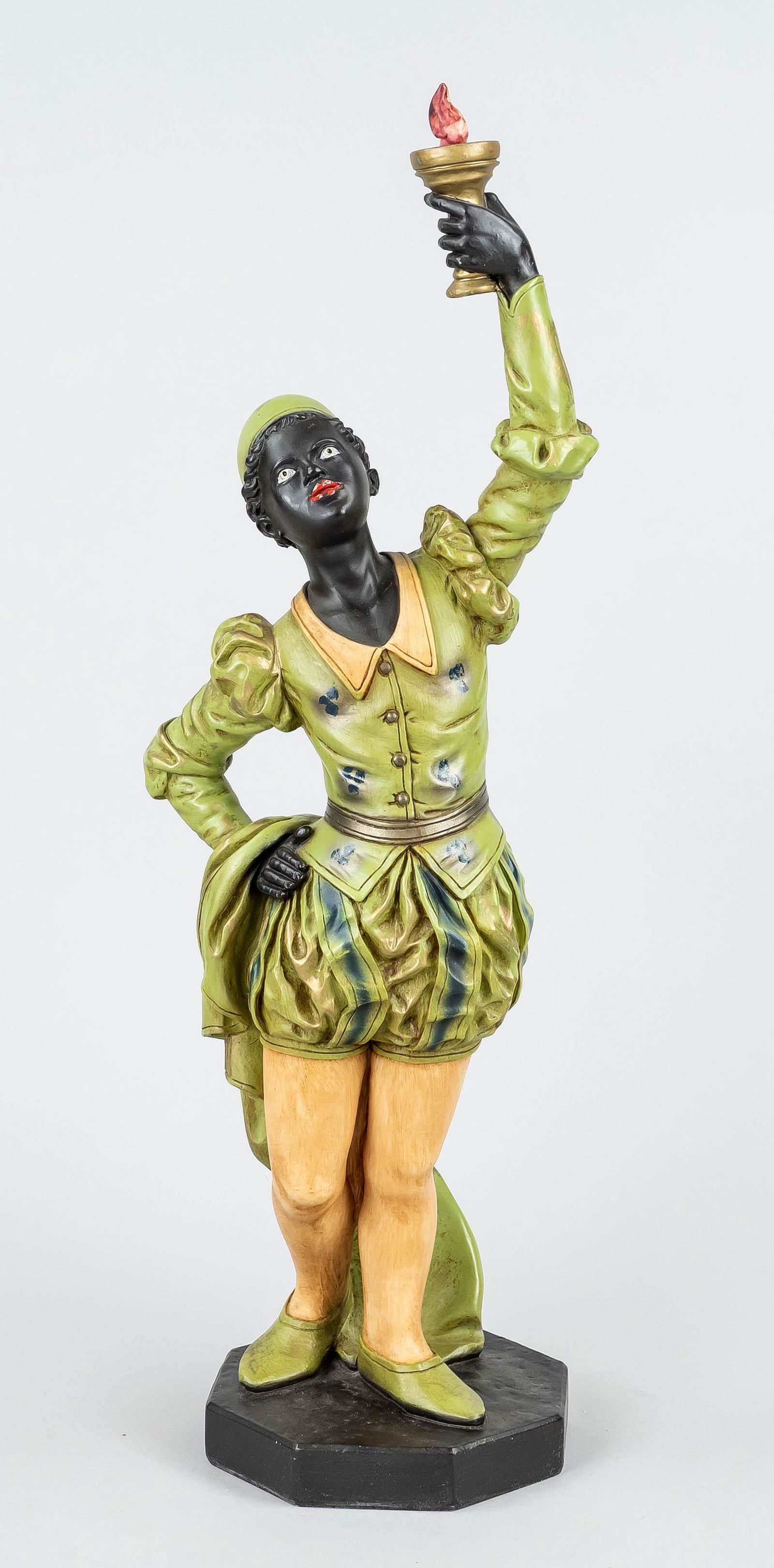 Torchbearer, 20th century, mass, polychrome painted. Standing in contrapost on an octagonal: Torchbearer, 20th century, mass, polychrome painted. Standing in contrapost on an octagonal plinth, looking up to the sky, slightly rubbed, h. 50 cm FackeltrÃ¤ger, 20. Jh., Masse, polychrom staffier