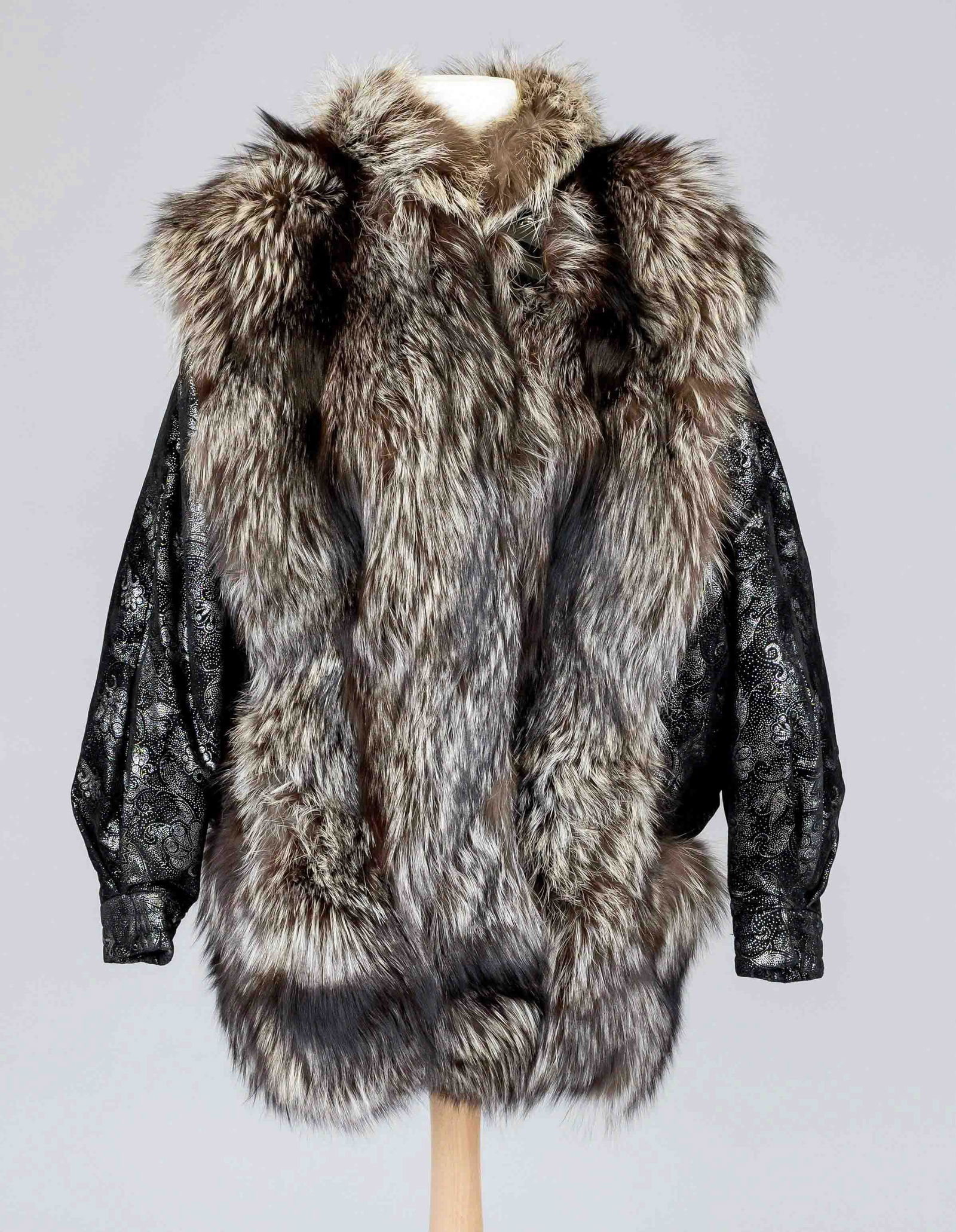 Ladies fox jacket with leather sleeves, 20th c., no name or size given. Lightly mottled fur, black (1 of 1)