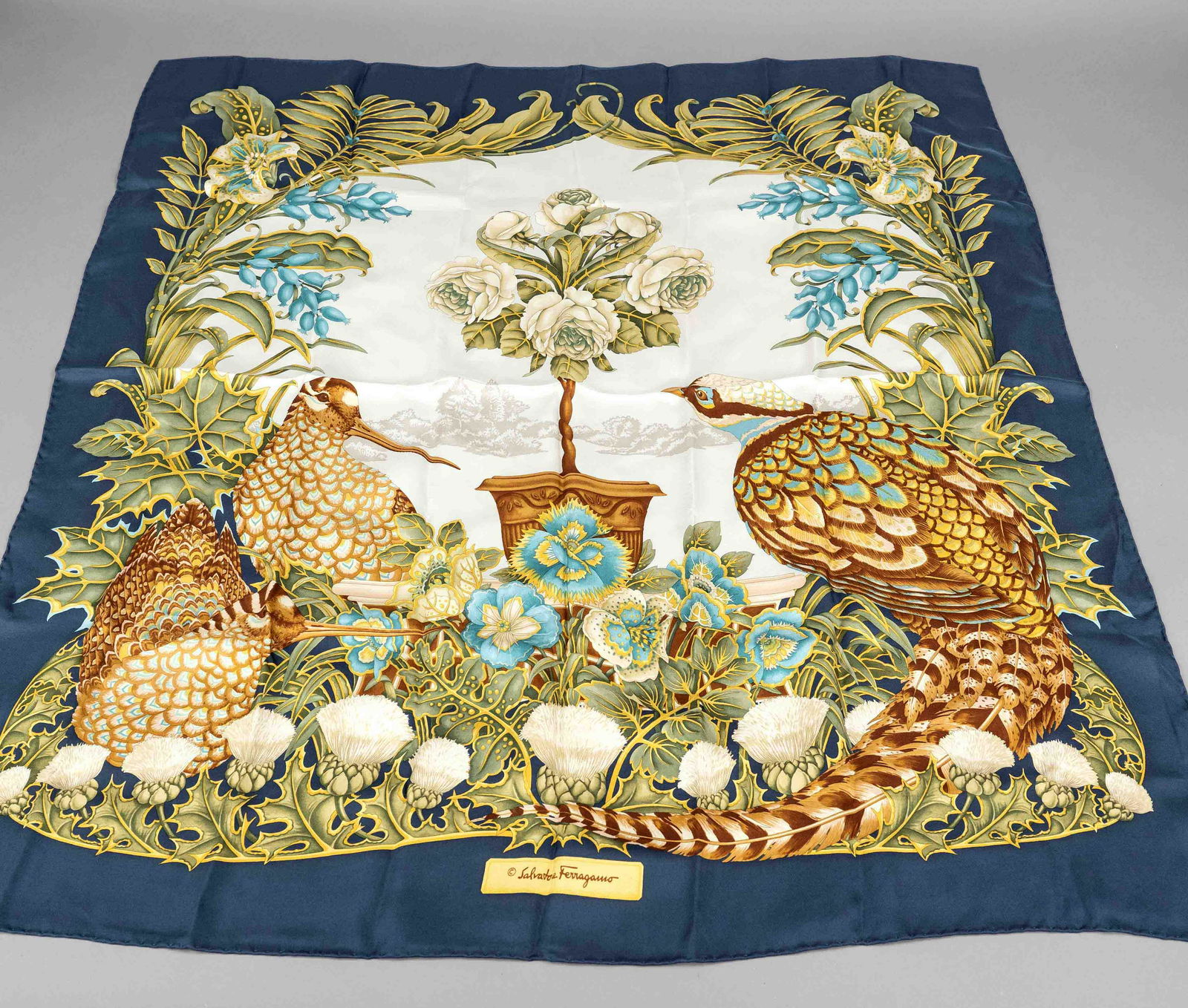 Salvatore Ferragamo, polychrome patterned square scarf of pure silk, rolled hem, storage marked, ca. (1 of 1)