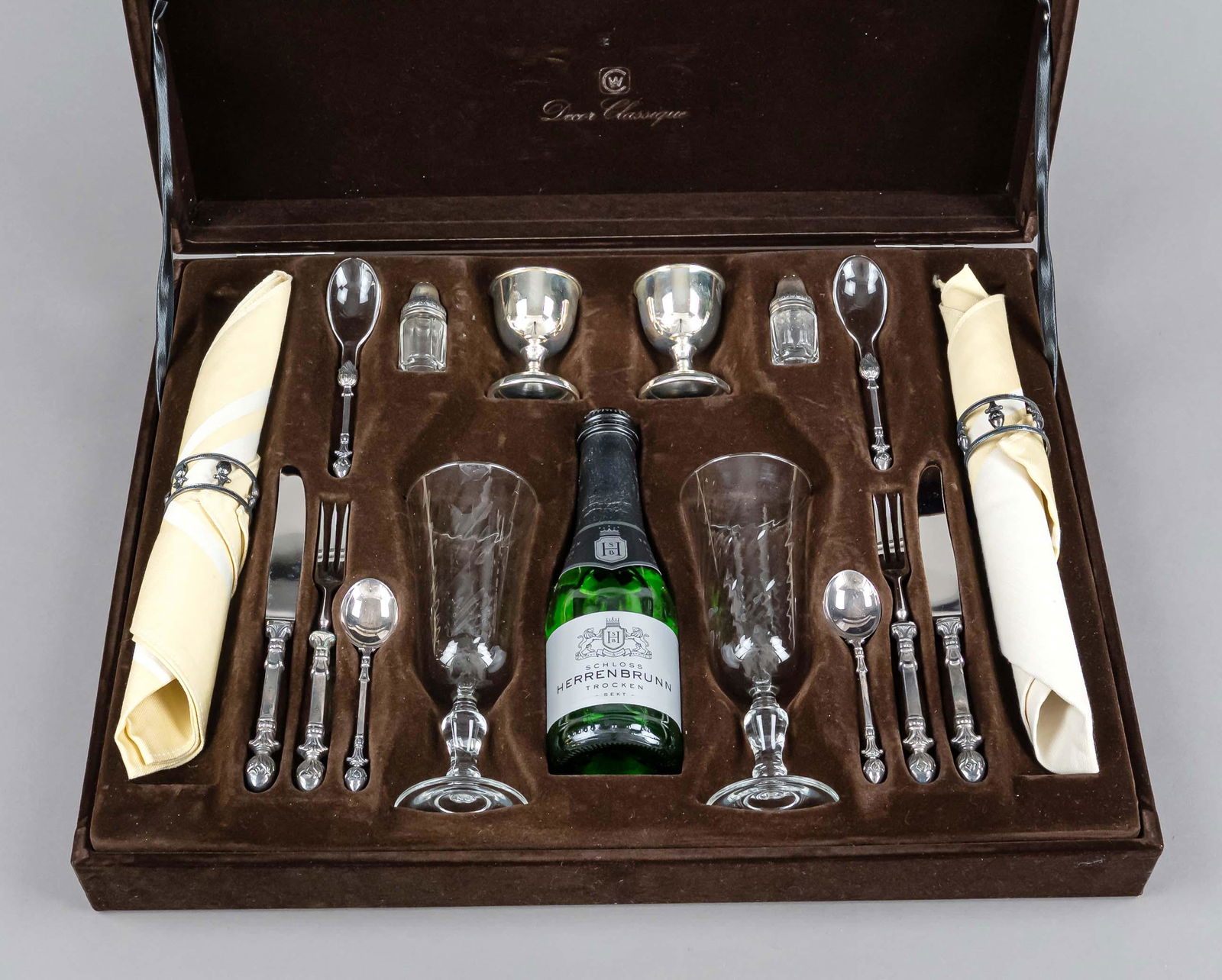 Wedding gift, German, 2nd half of 20th century, maker Christoph Widmann, plated and clear glass,: Wedding gift, German, 2nd half of 20th century, maker Christoph Widmann, plated and clear glass, each consisting of 2 champagne glasses, egg cups and salt shakers, 8 pieces of cutlery, 2 napkin rings