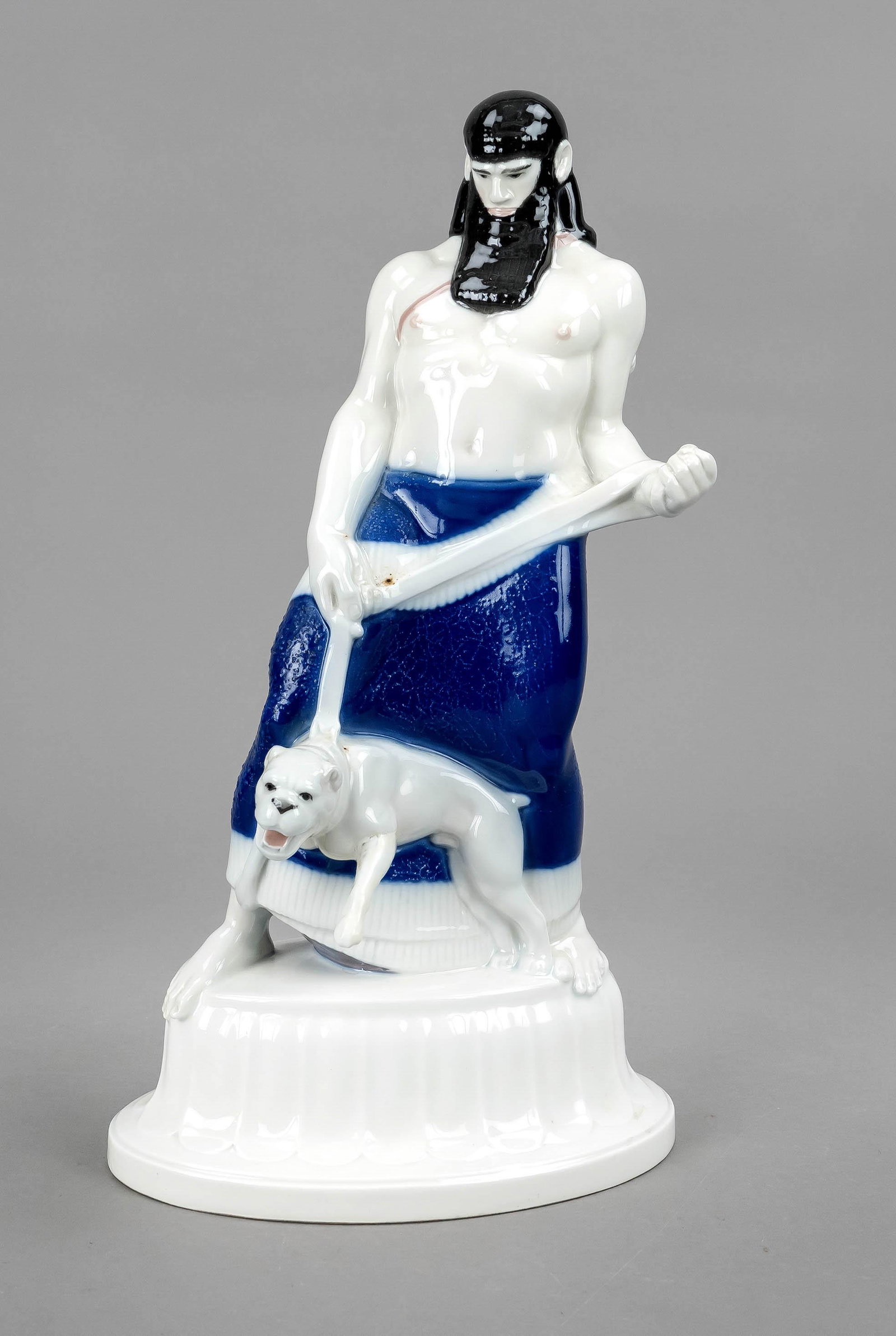 Assyrian with dog, KPM Berlin,: Assyrian with dog, KPM Berlin, mark before 1945, year letter for 1919, 2nd choice, blue imperial orb mark, model number 9614, on oval base with relief decoration, on base inscribed Amberg, design by A