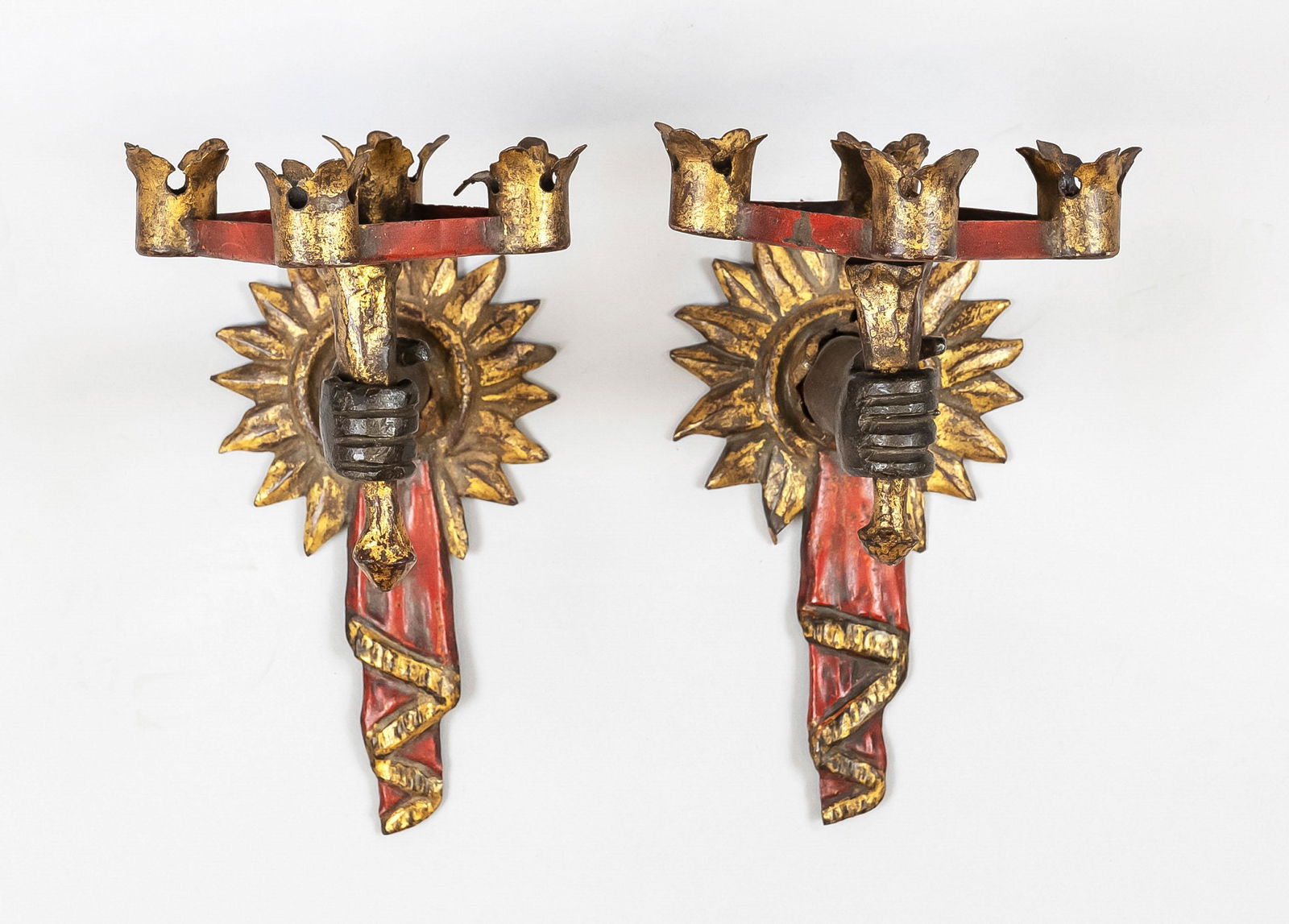 Pair of sconces, late 19th cen: Pair of sconces, late 19th century, iron, polychrome painted. Wall part as a sun wreath with a hanging cloth, candlestick as an arm holding a torch. Each with 4 spouts in the shape of small crowns, h.