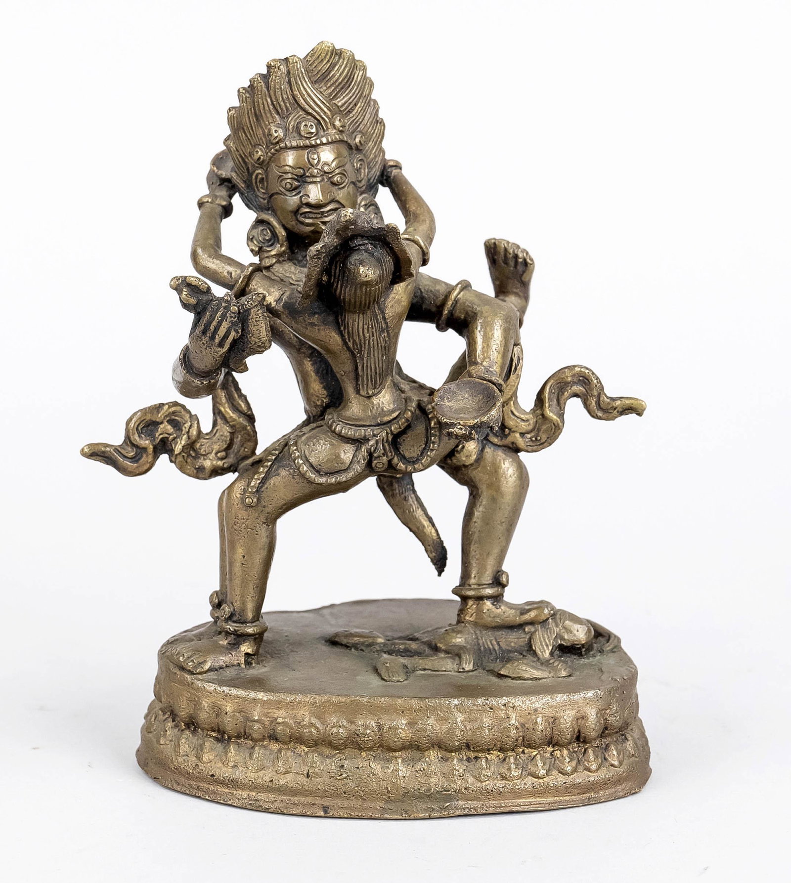 Mahakala with Shakti, India or: Mahakala with Shakti, India or Nepal, 20th c., brass casting, the guardian of the Tibetan Kagyu school in mystical union with his spiritual partner, h 15cm
