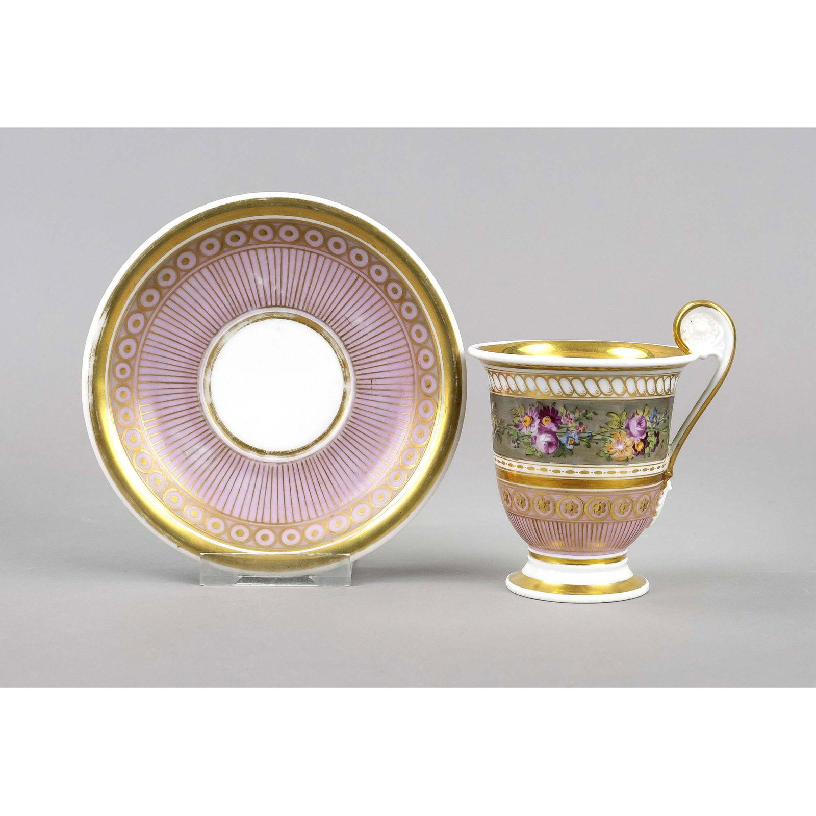 Biedermeier cup and saucer, 19: Biedermeier cup and saucer, 19th century, bell-shaped with raised rosette handle, frieze with floral painting on gray background, ornamental gilding, h. 12 cm