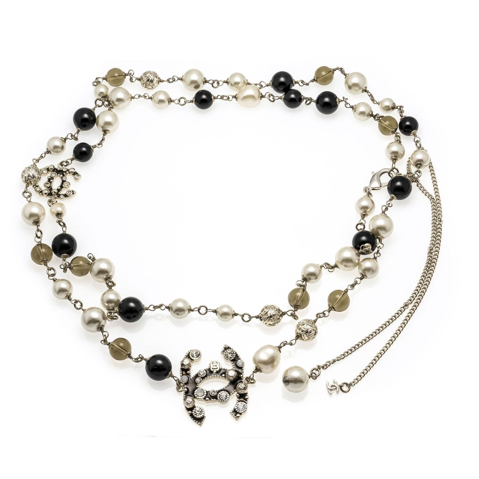Large Chanel cocktail necklace wi: Large Chanel cocktail necklace with black and white artificial pearls and various gemstones, with lobster clasp, l. 120 cm, Chanel marked, 134 g, with black velvet pouch